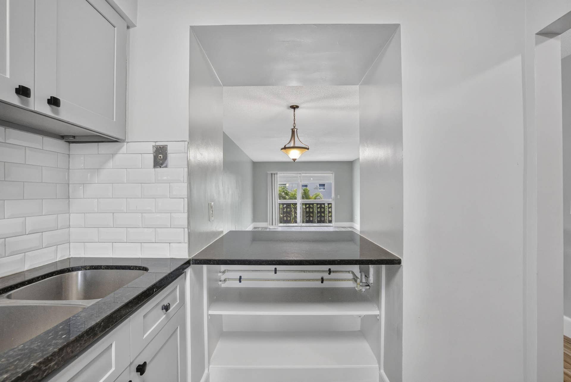 801 Pine Drive, #12, Pompano Beach, FL 33060 Kitchen w/ Passthrough