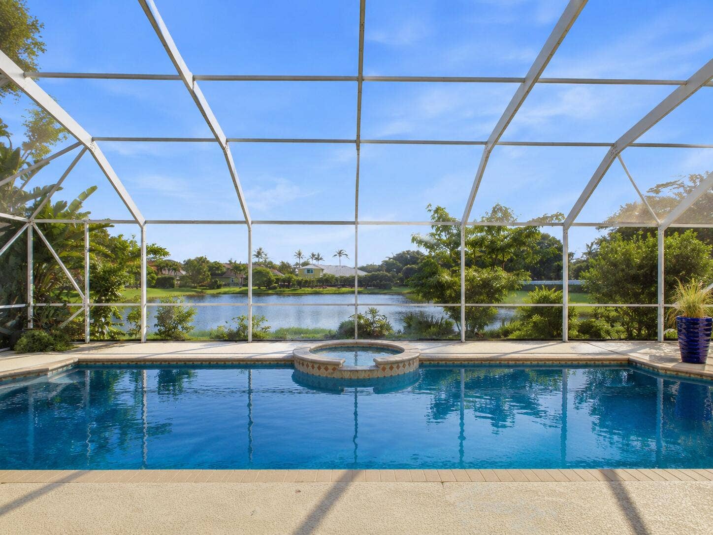 Relax in your own resort style pool while gazing at the beautiful lake view