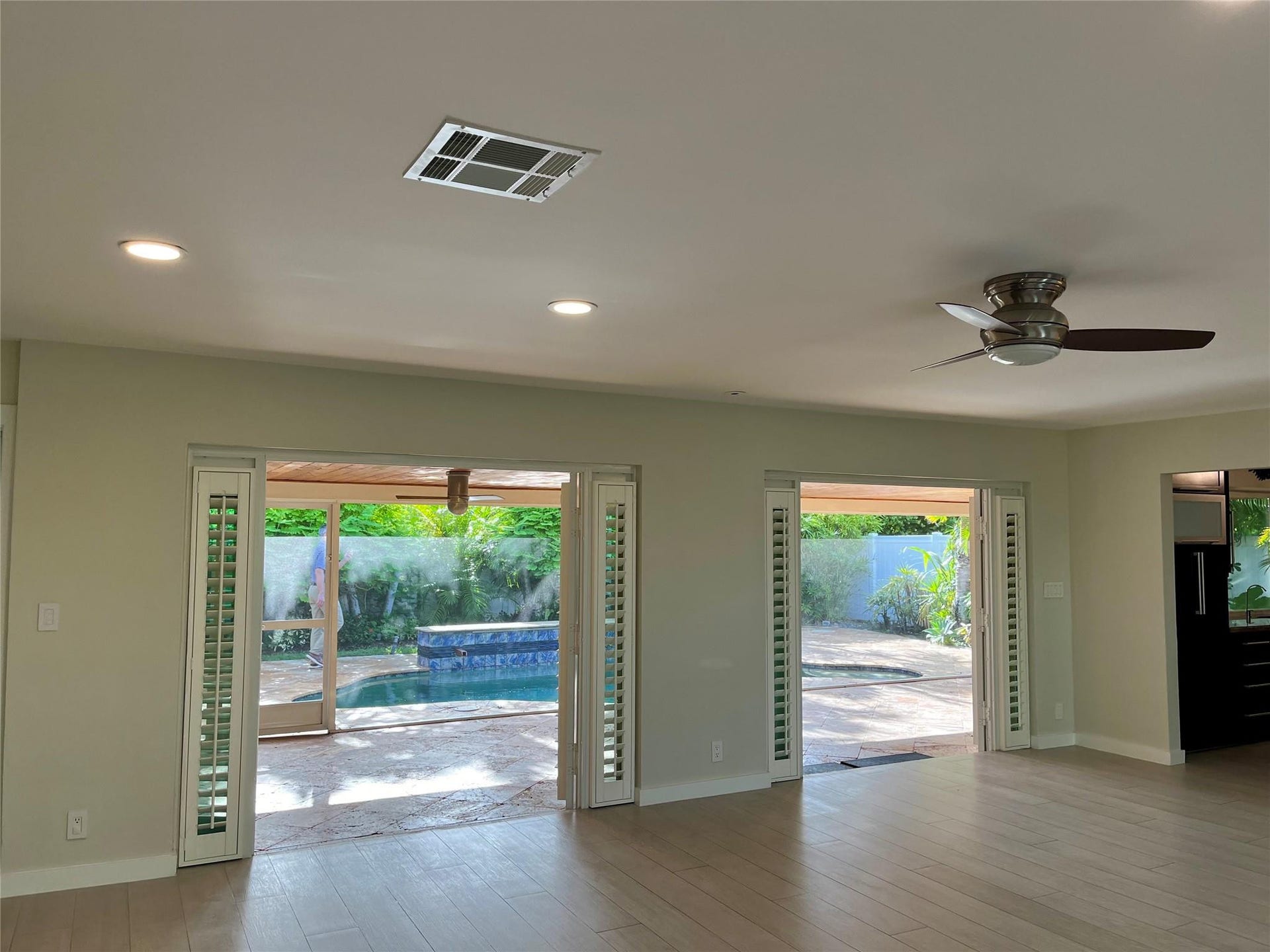 4070 NE 26th Avenue, Fort Lauderdale, Fort Lauderdale, FL 33308 Open doors to the screened in patio area