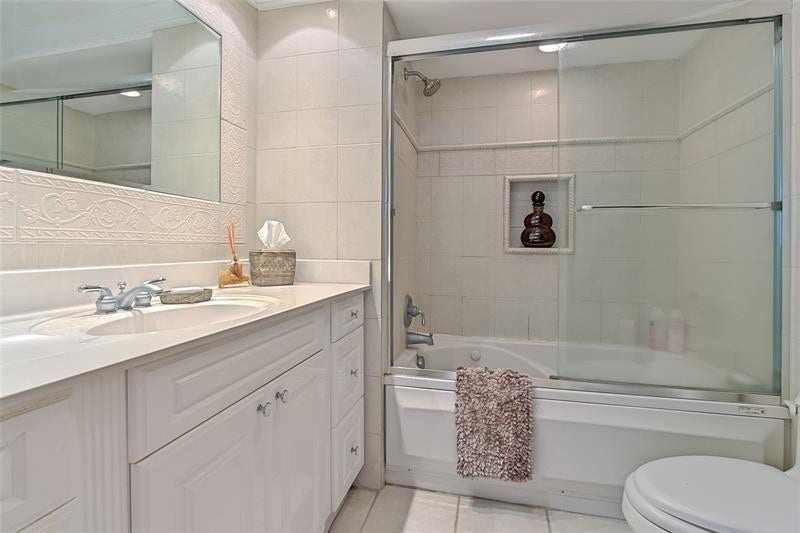 Primary Bathroom with Tub and Shower