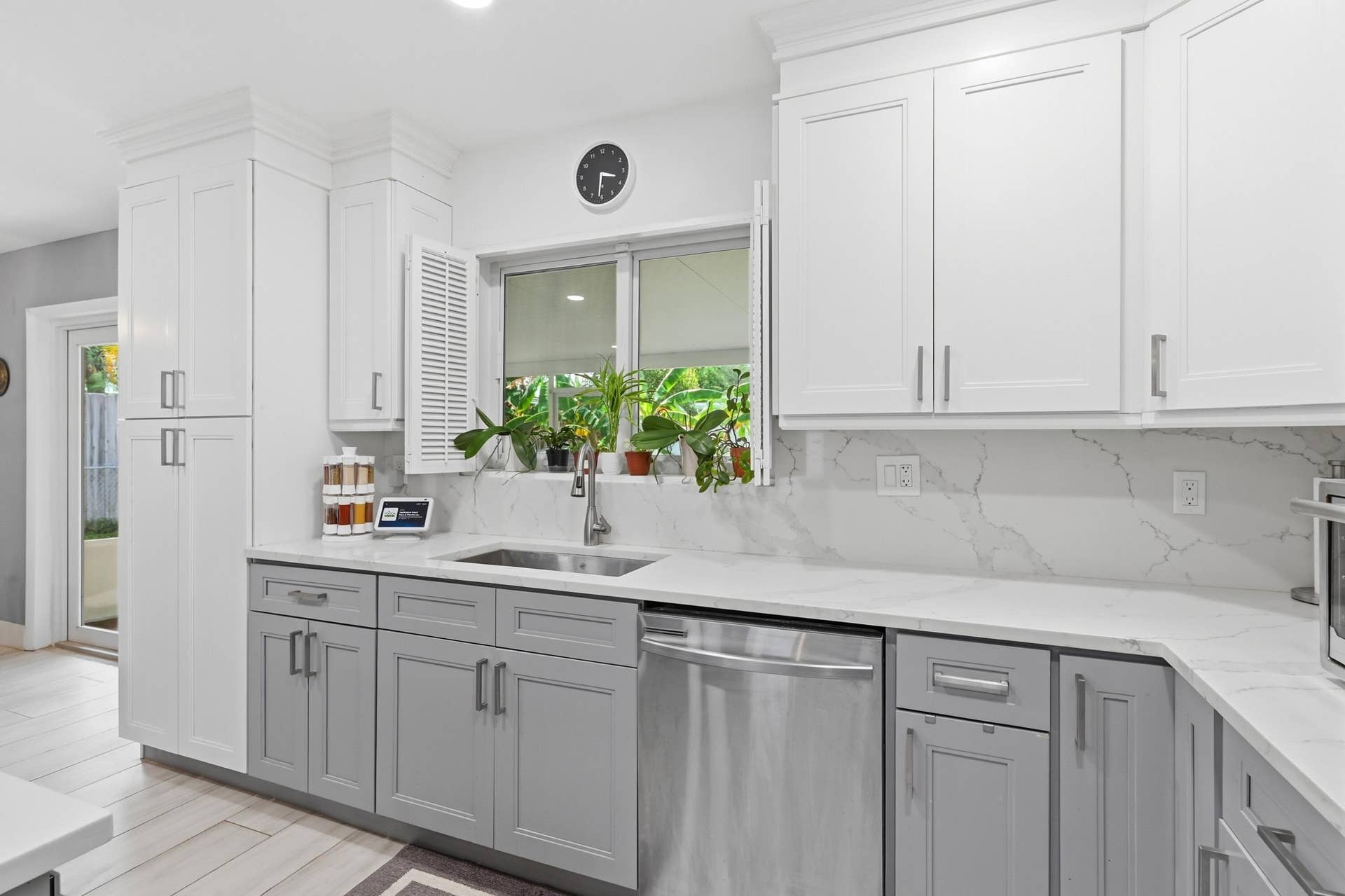 141 SE 8th Street, Pompano Beach, FL 33060 Beautiful cabinetry, quality finishes, and thoughtful updates make this renovated kitchen both stylish and functional.