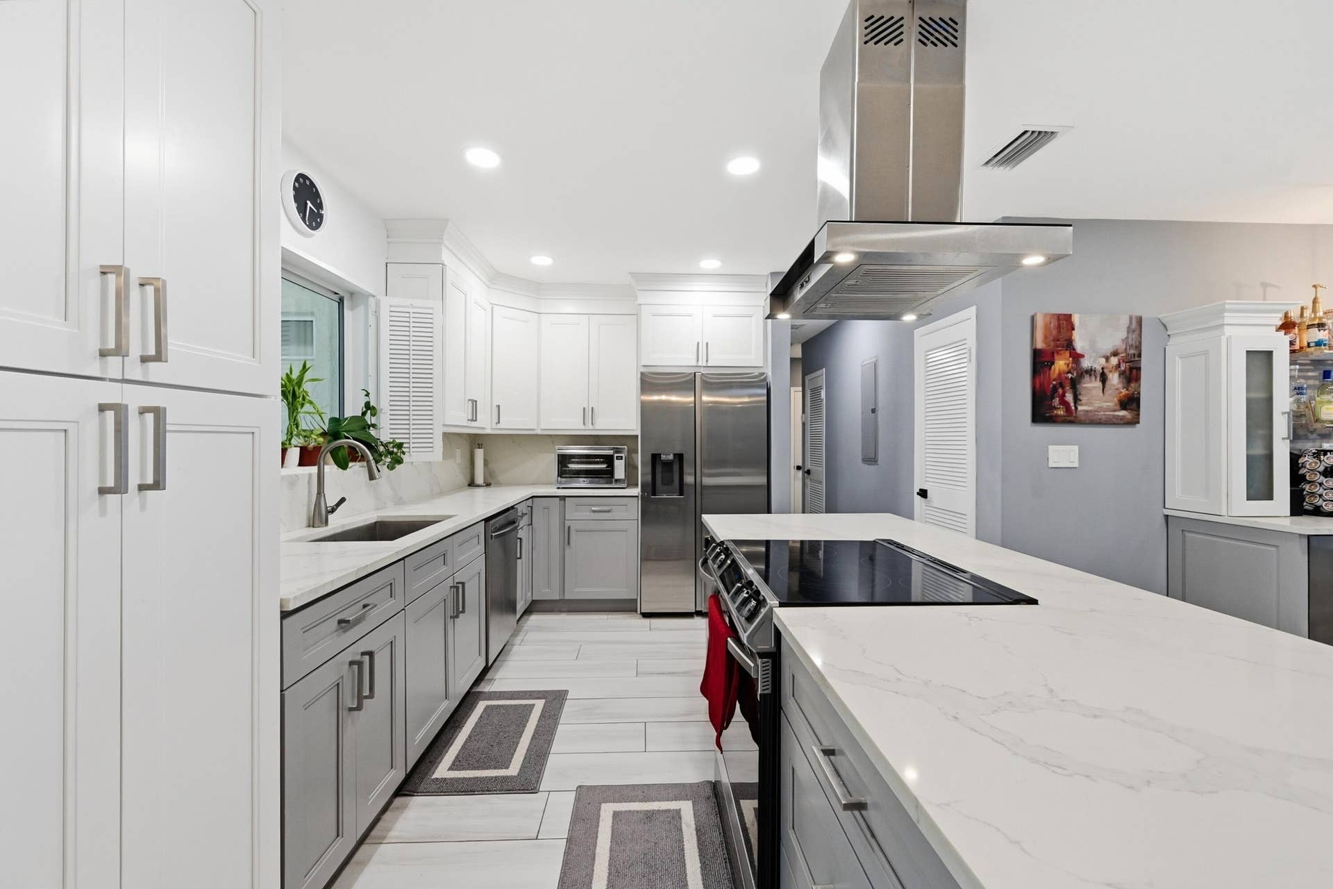 141 SE 8th Street, Pompano Beach, FL 33060 Beautifully renovated kitchen designed for everyday living, entertaining, and making lasting memories.