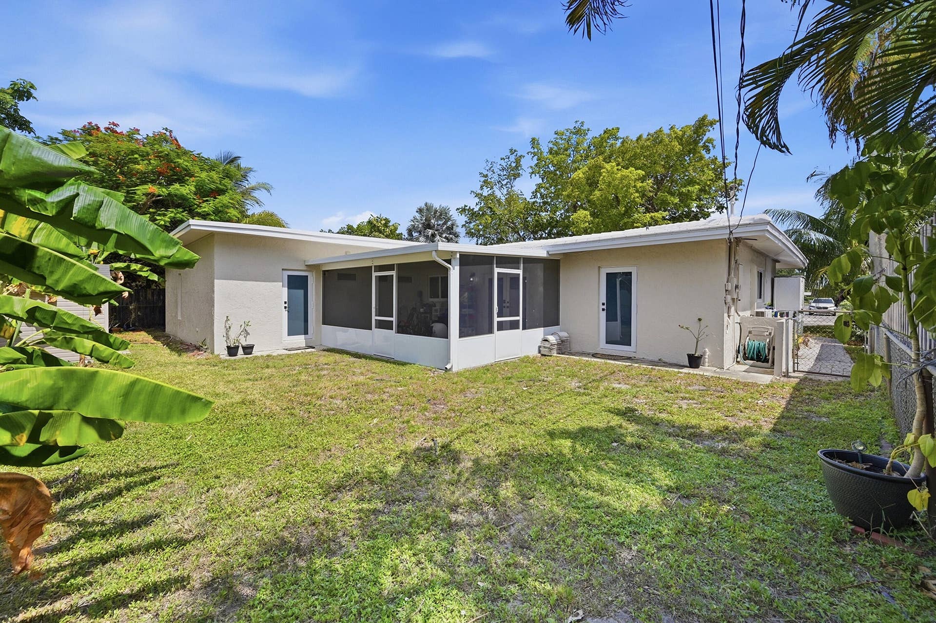 141 SE 8th Street, Pompano Beach, FL 33060 Private backyard offering space to unwind, entertain, or simply enjoy the South Florida lifestyle.