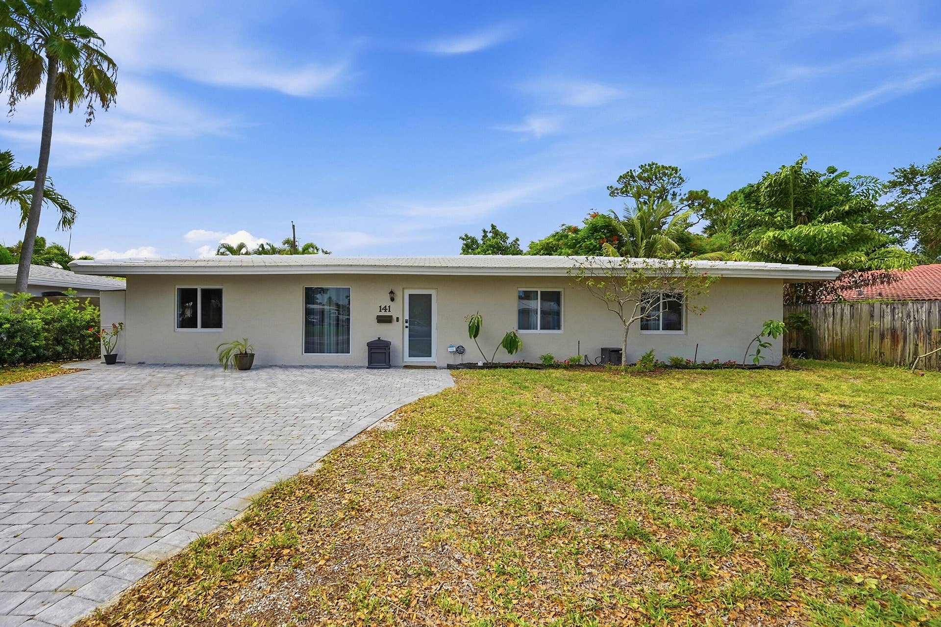 141 SE 8th Street, Pompano Beach, FL 33060 New driveway, impact windows and doors, and exceptional pride of ownership welcome you home.