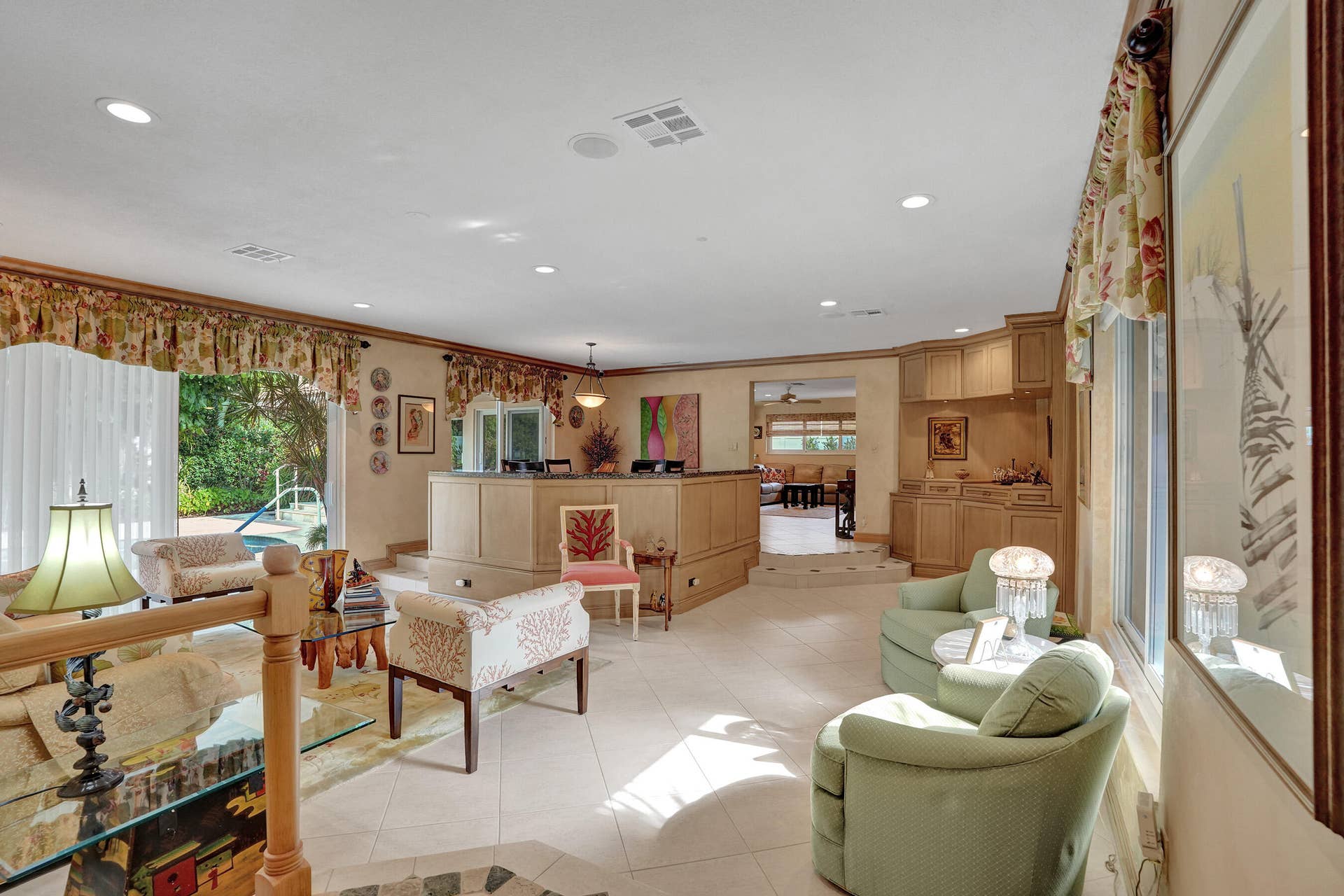 11 Tam O'shanter Lane, Fort Lauderdale, FL 33308 Open living room and dining area. Family, dining, breakfast nook toward the back right of the photo.
