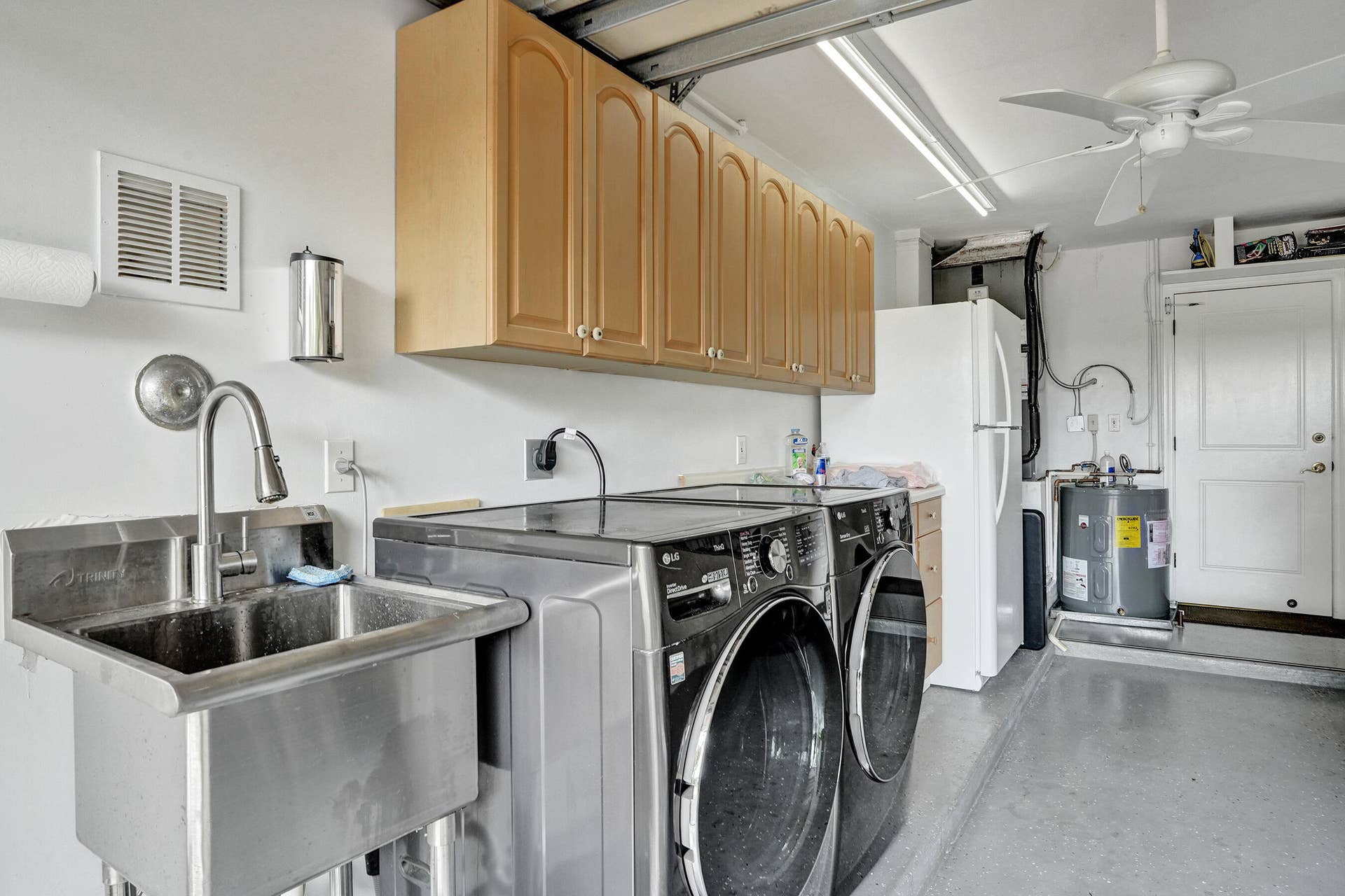 11 Tam O'shanter Lane, Fort Lauderdale, FL 33308 Washer/Dryer, 2nd refrigerator, utility sink; located in garage.