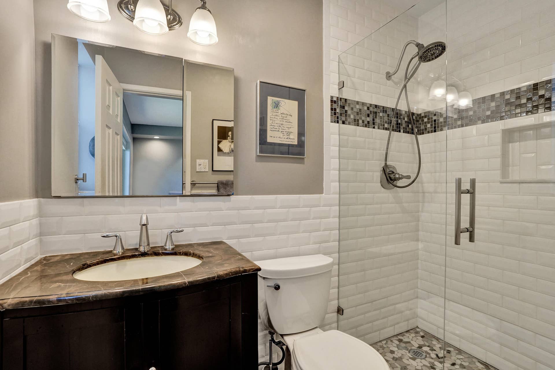 Completely remodeled primary bath with timeless finishes, quality craftsmanship, and move-in-ready design.
