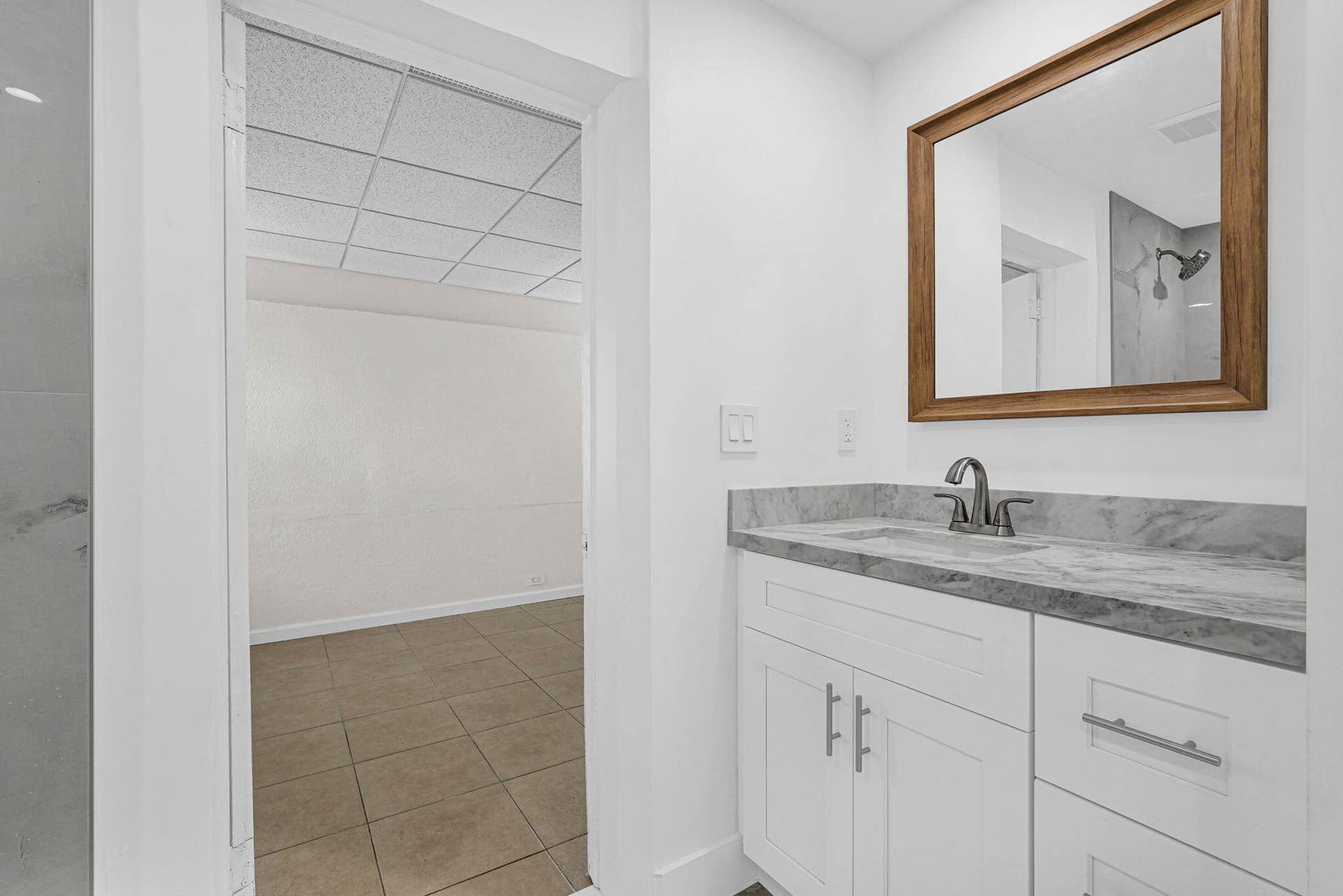 261 NE 45th Street, Oakland Park, FL 33334 76-web-or-mls-Remodeled Primary Bathroom