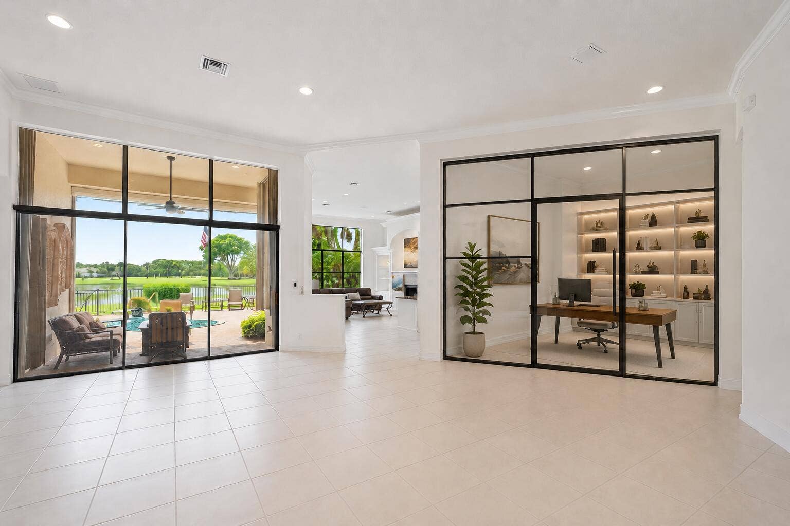 This is a rendering demonstrating how renovations, including adding glass walls and a doorway, could transform the dining room into a den or office.