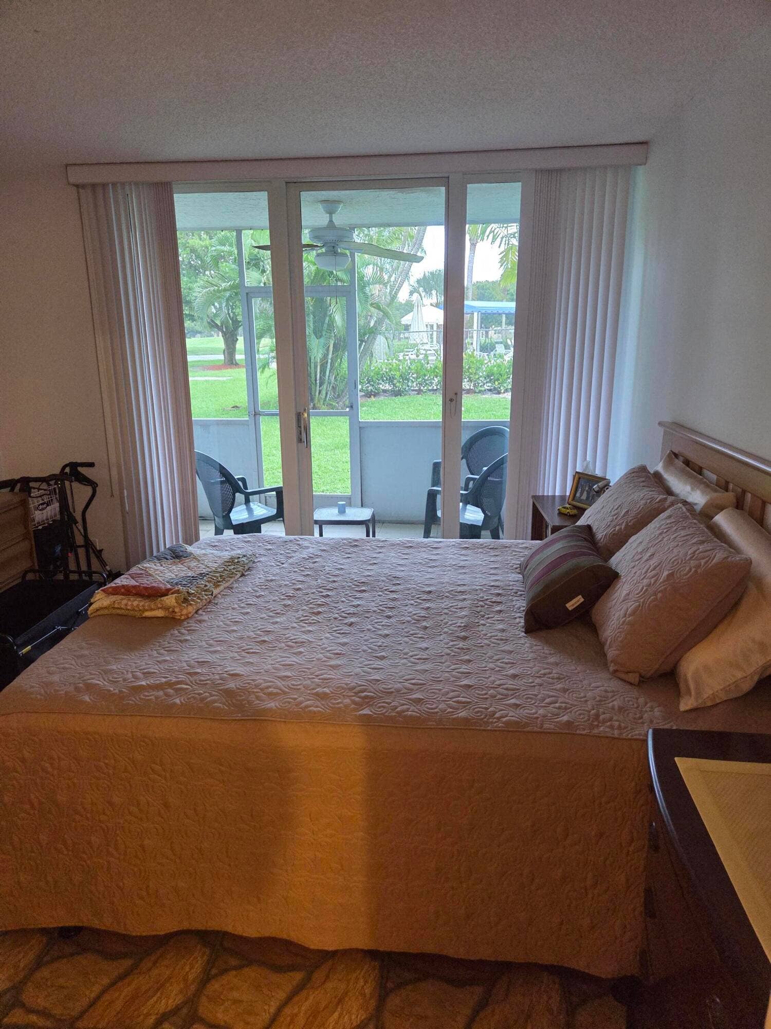 Master bedroom sliding glass Impact door. Heading out to your back porch and swimming pool entrance.