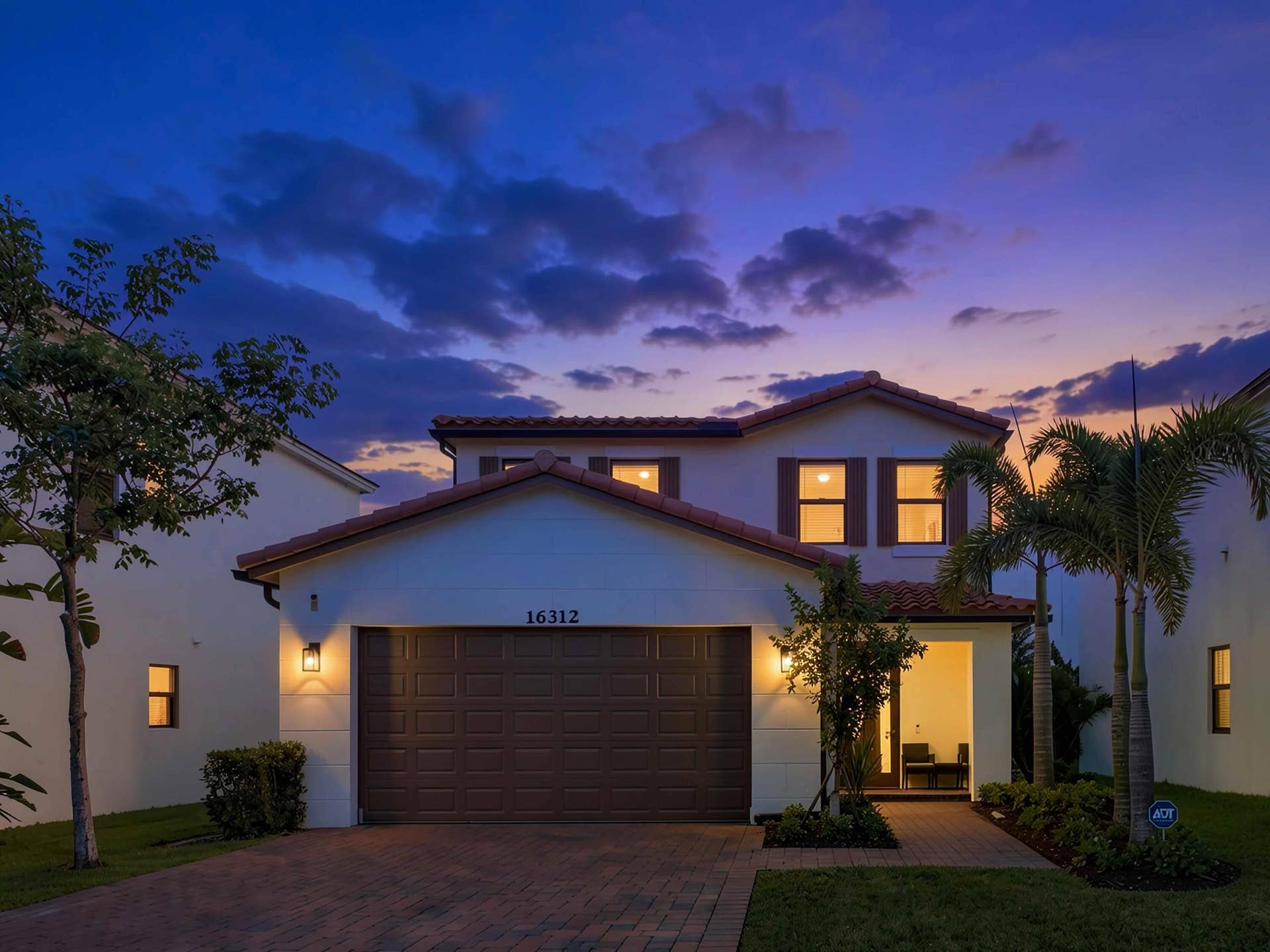 16312 Sandy Shore Drive, Westlake, FL 33470 This image has been Ai Edited to illustrate the property's Dusk or Twilight View