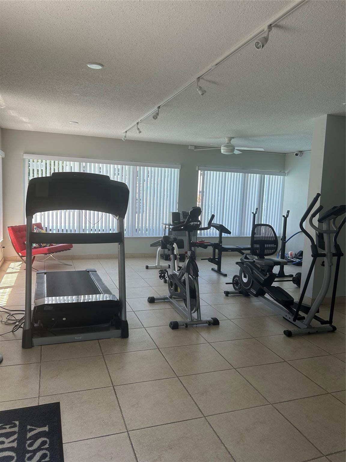 550 Bayshore Drive, #102, Fort Lauderdale, FL 33304 Gym includes: walking tread, bicycle, weights, benches, chairs, steps, verticle blinds, dimmer lighting and fans, centeral a/c,