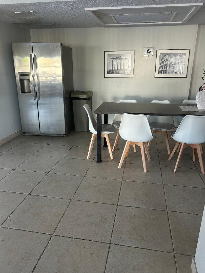 550 Bayshore Drive, #102, Fort Lauderdale, FL 33304 private use of room allowed for occasion: refrigerator, tables n chairs, couches,