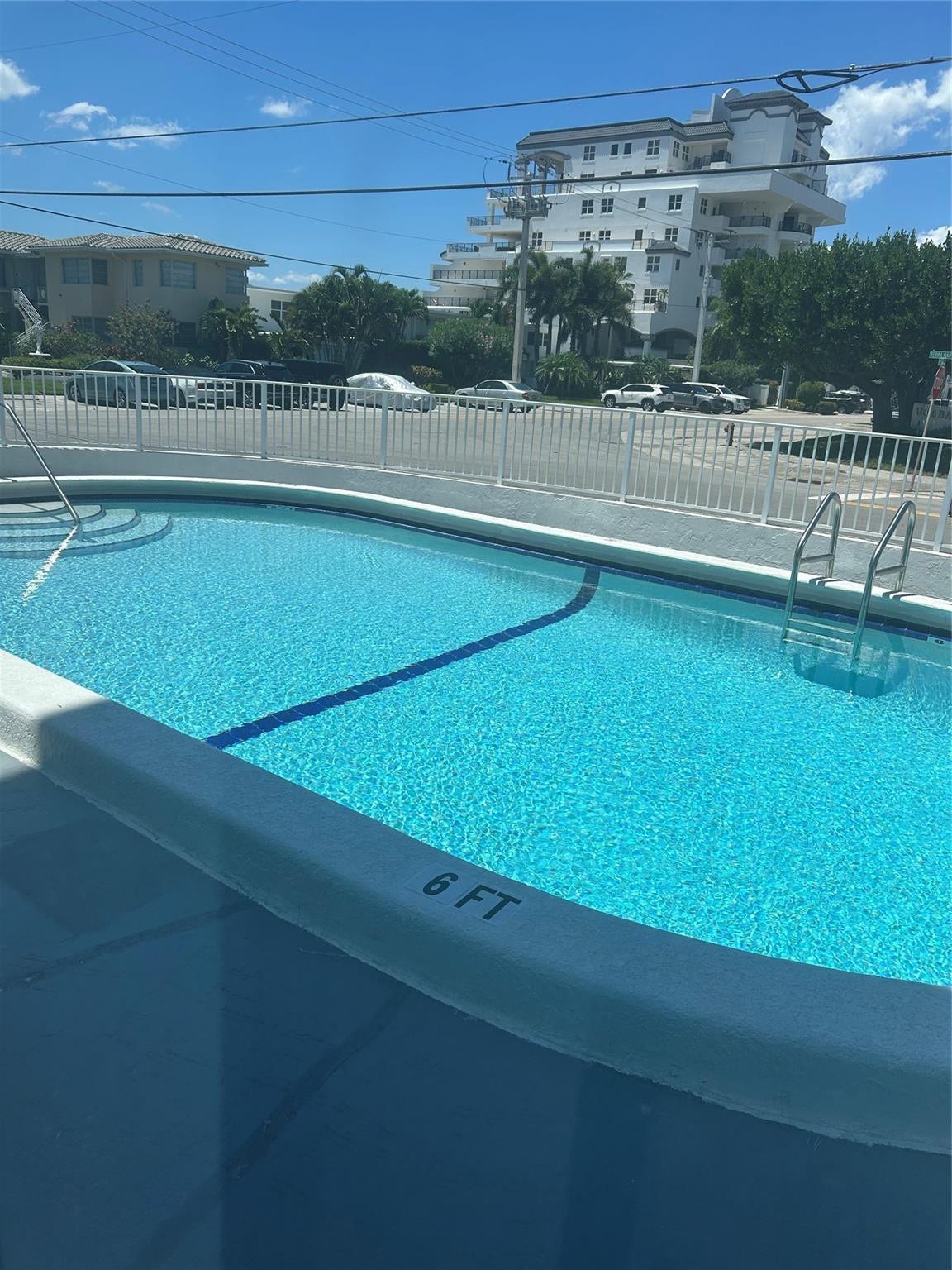 550 Bayshore Drive, #102, Fort Lauderdale, FL 33304 Heated inground pool railings, steps, changing colored lighting