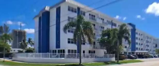 550 Bayshore Drive, #102, Fort Lauderdale, FL 33304 corner location building has five floors, fenced pool patio area, grass n trees, canopy entry,assigned parking in front and rear with guest spaces