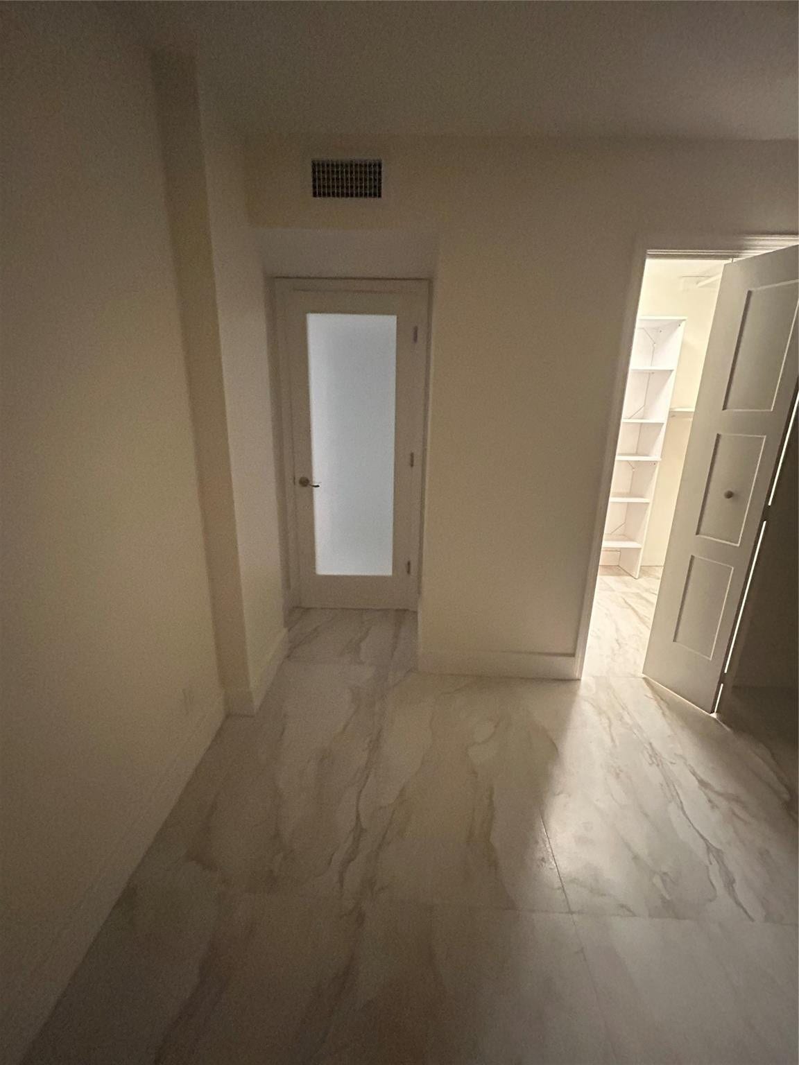 550 Bayshore Drive, #102, Fort Lauderdale, FL 33304 New wood base boards throughout the room and new paint. The walk-in closet new bifold door opens to the left side. New frosted glass door separates the room from the hallway
