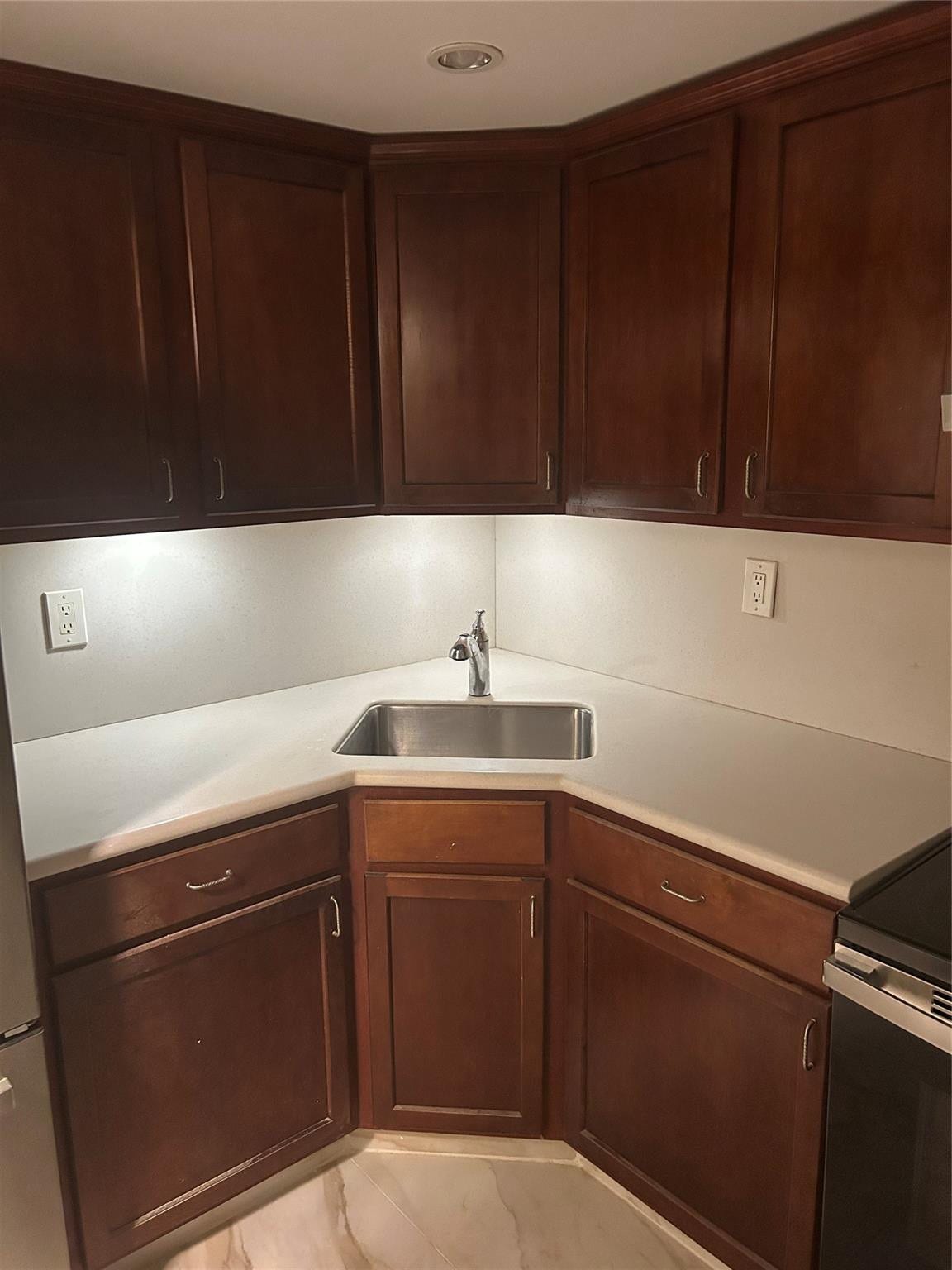 550 Bayshore Drive, #102, Fort Lauderdale, FL 33304 the interior hallway of this unit to the right side has the kitchen