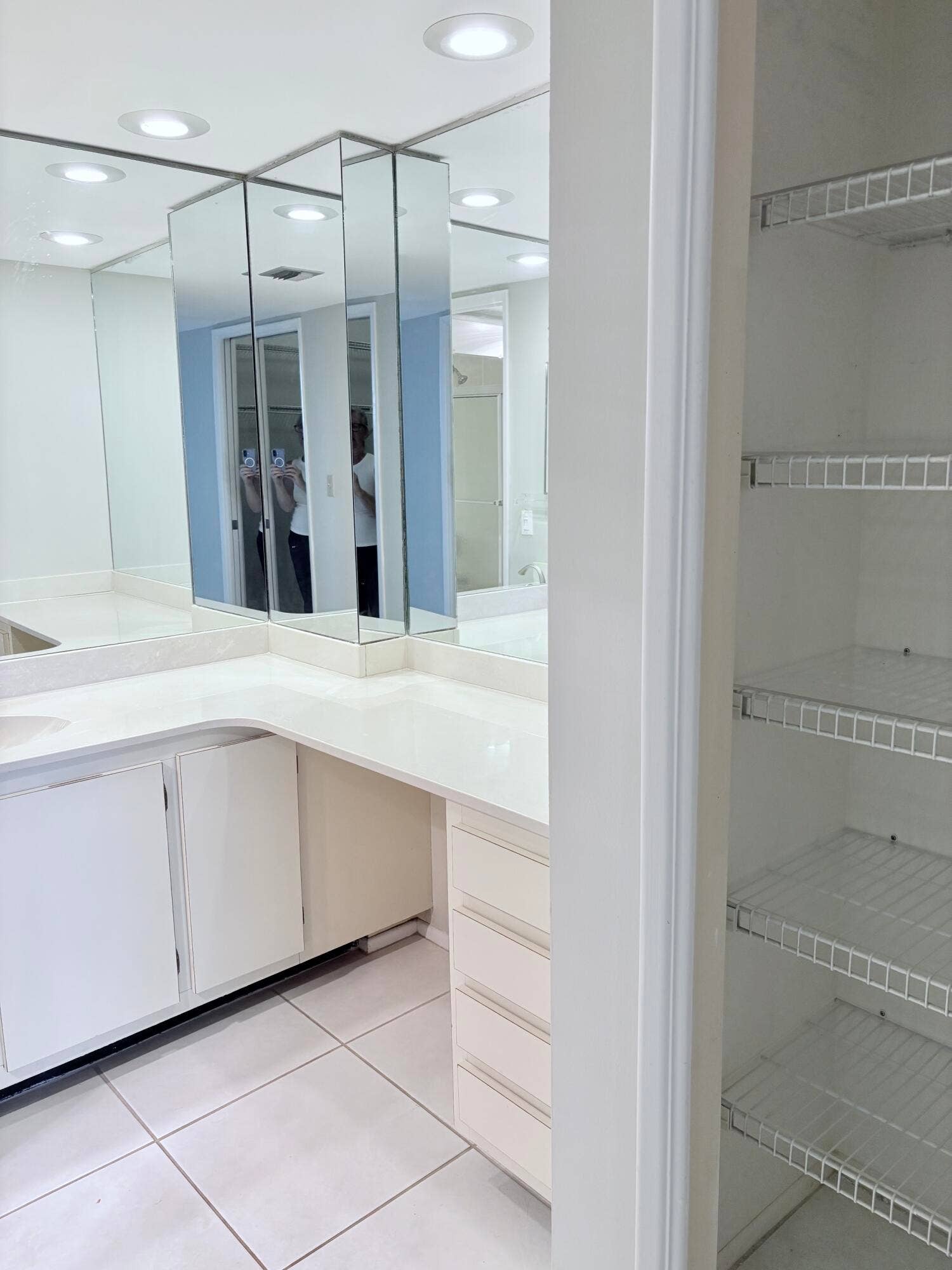 804 Cypress Grove Lane, #508, Pompano Beach, FL 33069 Vanity area with a linen closet.