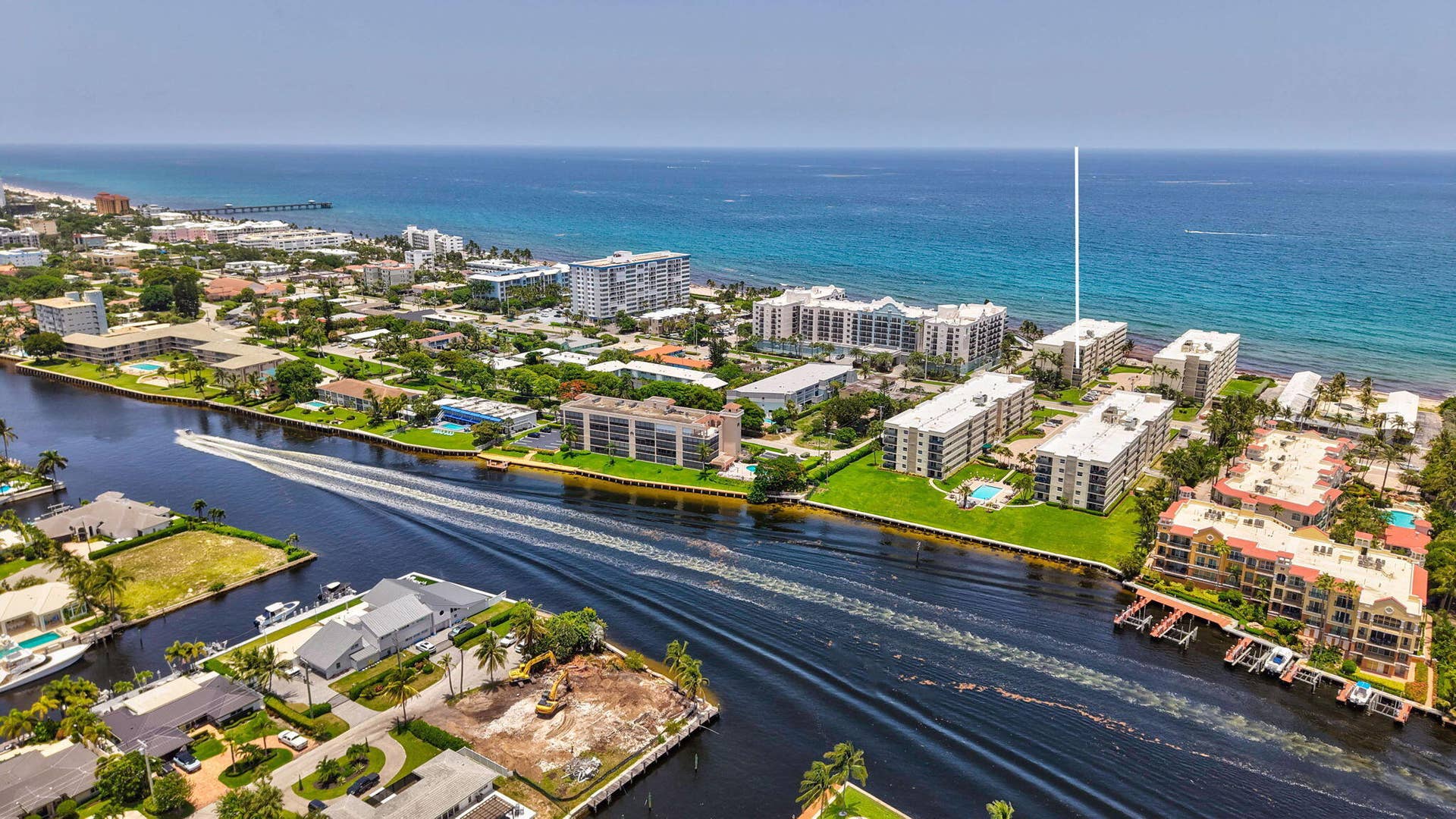 1239 Hillsboro Mile, #302, Hillsboro Beach, FL 33062 Coastal community featuring waterway access, residential buildings, and proximity to the ocean