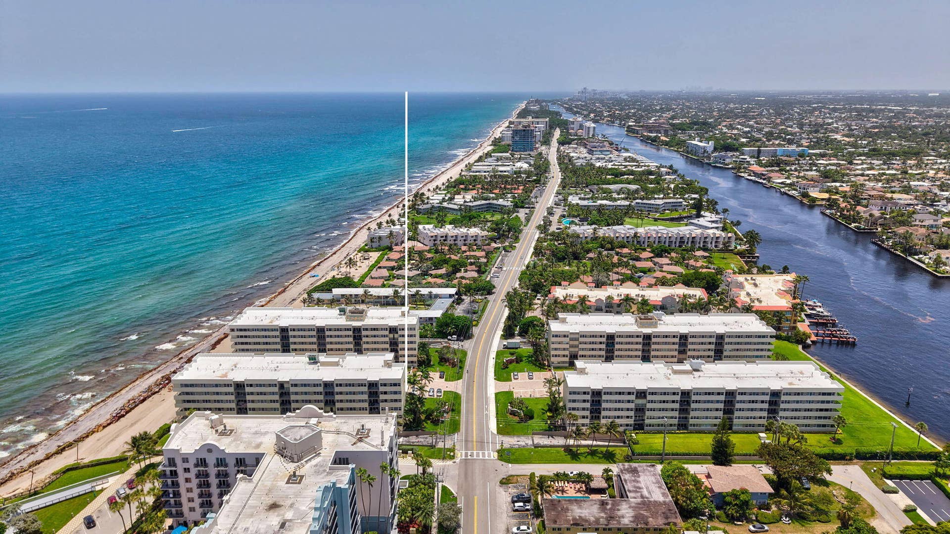 1239 Hillsboro Mile, #302, Hillsboro Beach, FL 33062 Aerial perspective highlighting beachfront properties, a coastal road, and an Intracoastal Waterway
