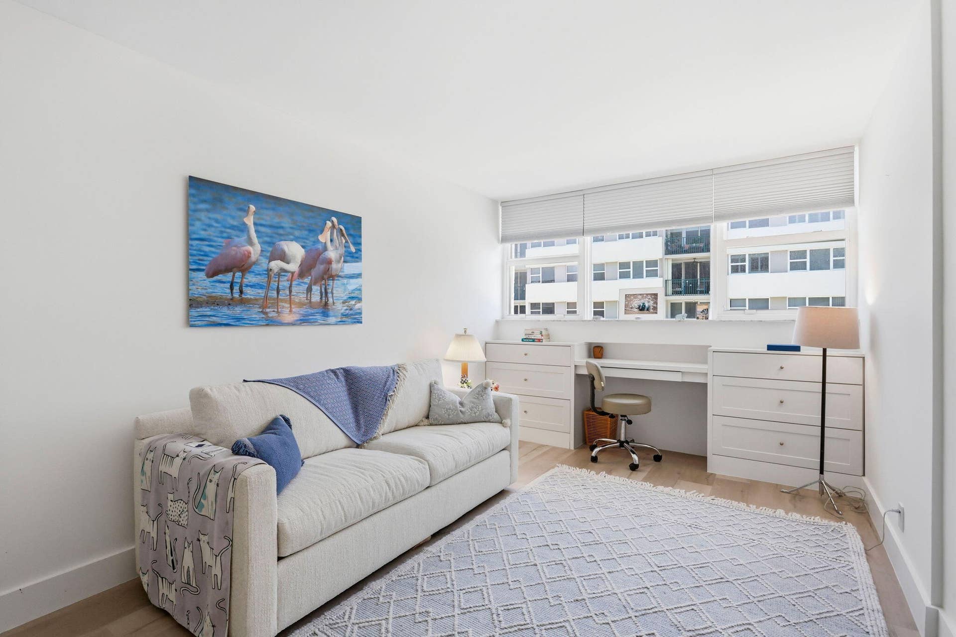 1239 Hillsboro Mile, #302, Hillsboro Beach, FL 33062 Built-in desk with integrated storage and a wide window with horizontal blinds