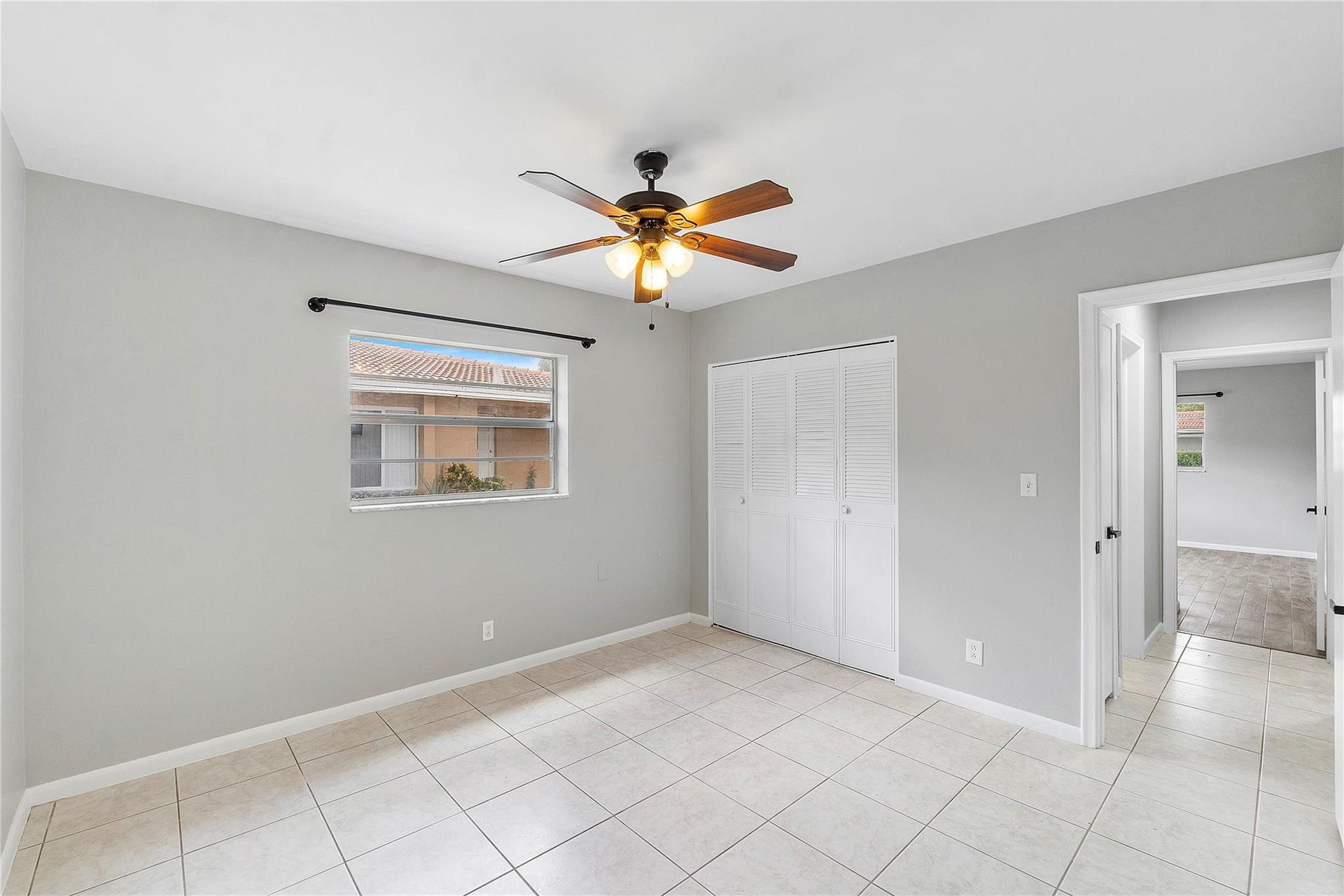 3843 NW 81st Terrace, Coral Springs, Coral Springs, FL 33065 Light-toned tile flooring throughout the room