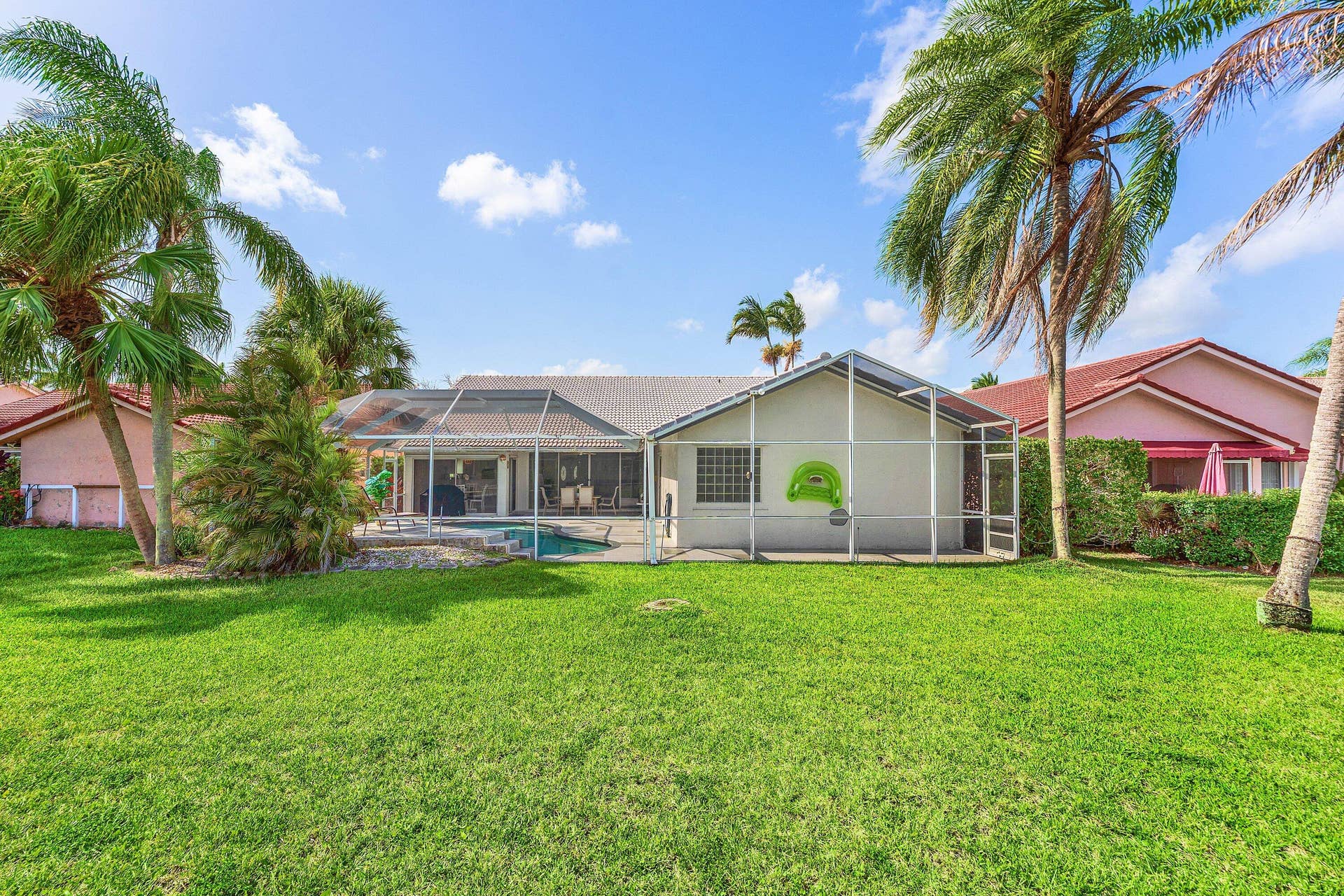 Room to roam behind your tropical oasis!