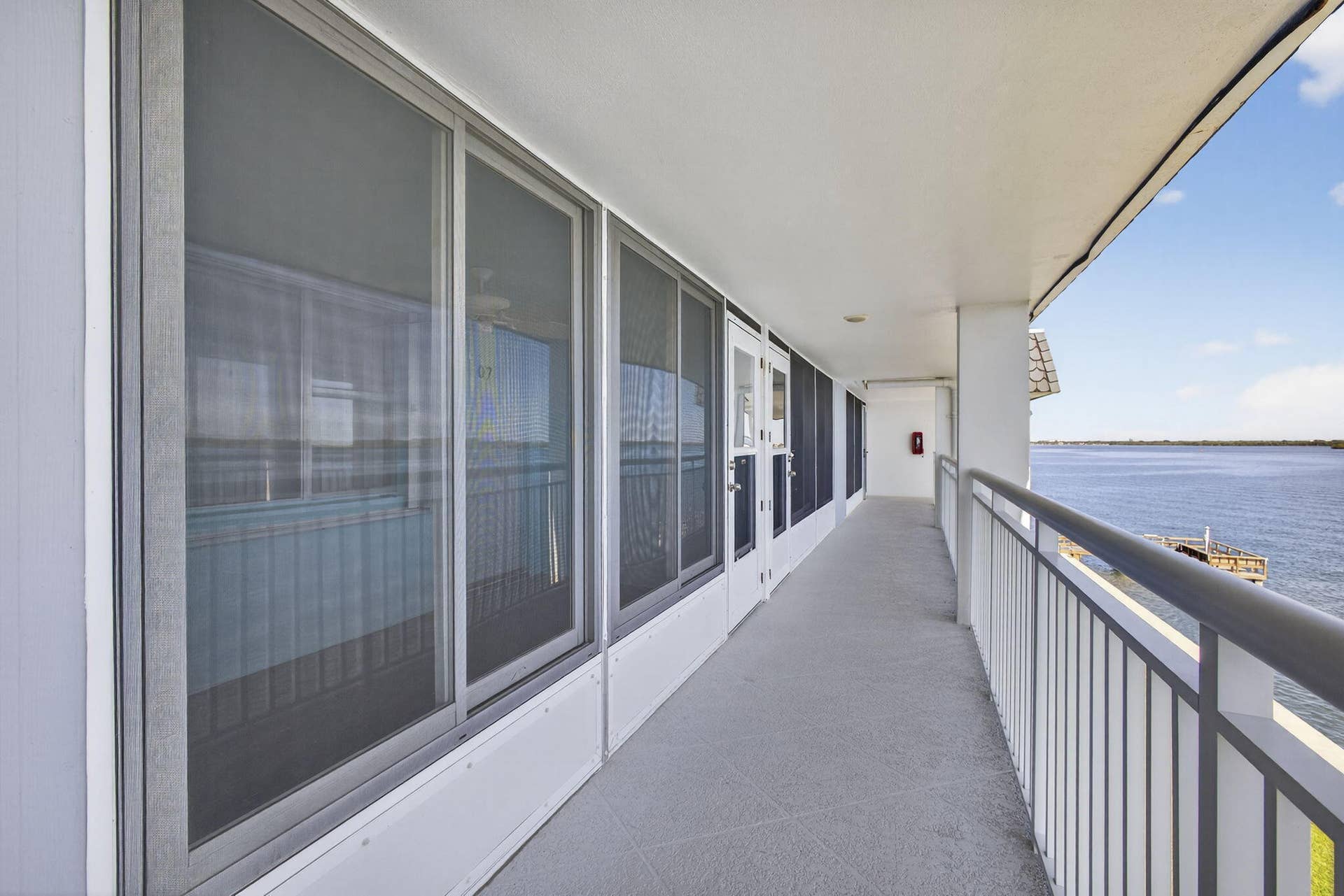 100 Shore Court, #307, North Palm Beach, FL 33408 catwalk to unit
