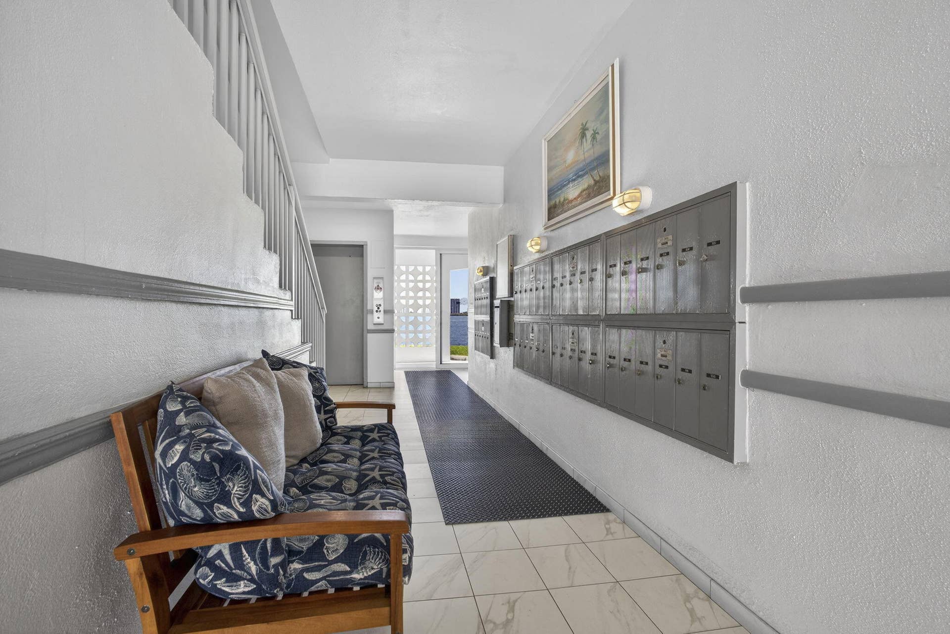 100 Shore Court, #307, North Palm Beach, FL 33408 mailboxes elevator and stairs