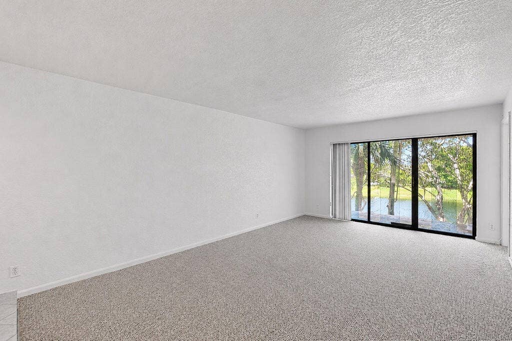 Living area & balcony with lake view