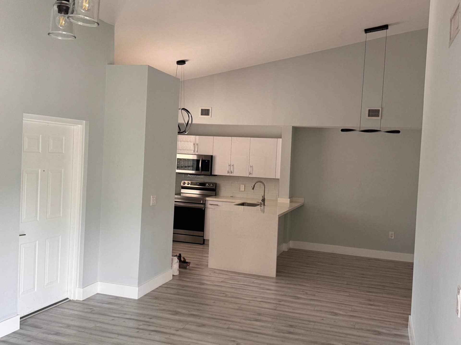 6936 SW 39th Street, #D203, Davie, FL 33314 ENTRANCE TO LIVING AREA AND KITCHEN