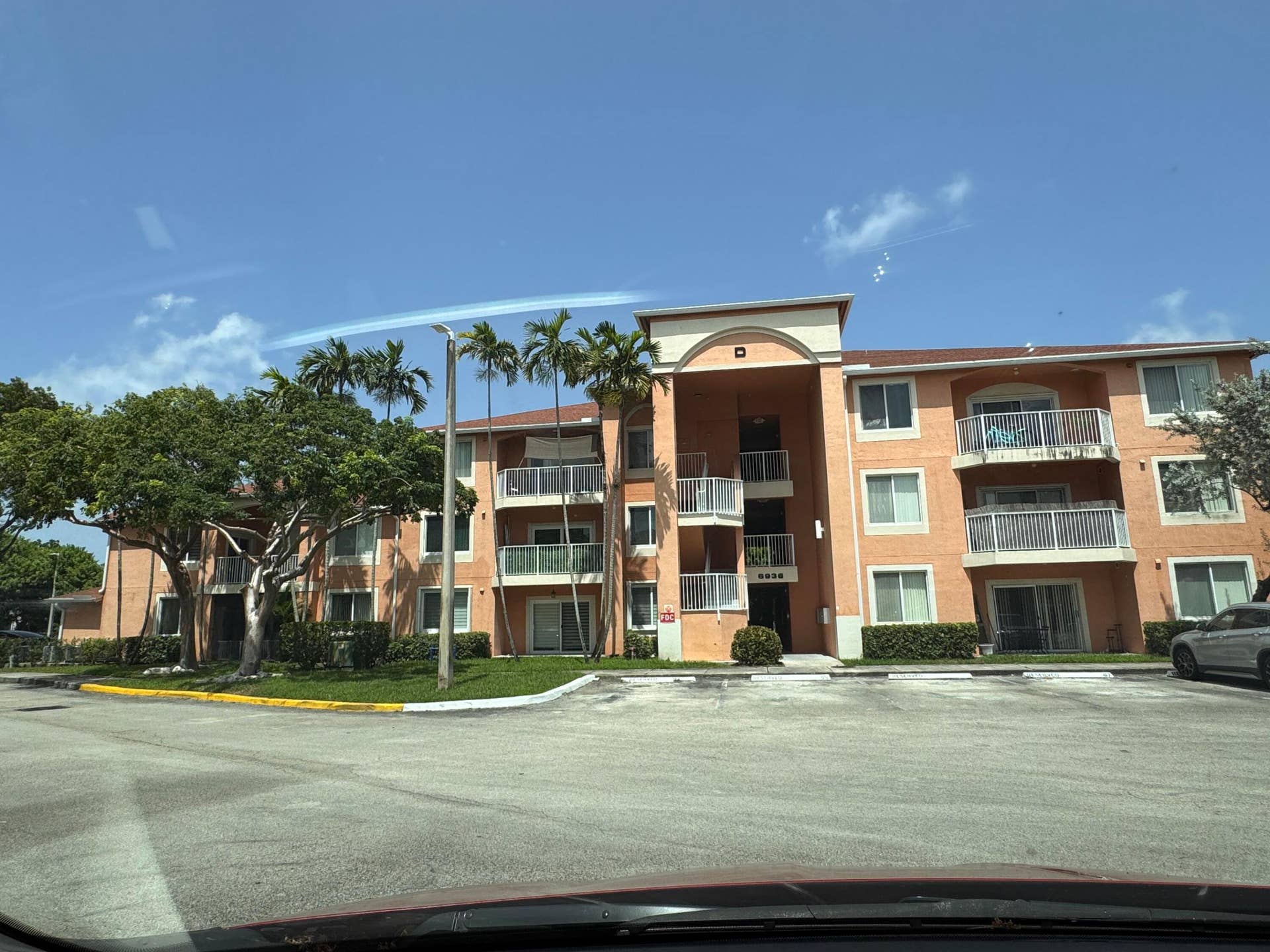 6936 SW 39th Street, #D203, Davie, FL 33314 WEST SIDE OF BUILDING, UNIT IS ON LEFT SIDE CORNER OF PICTURE