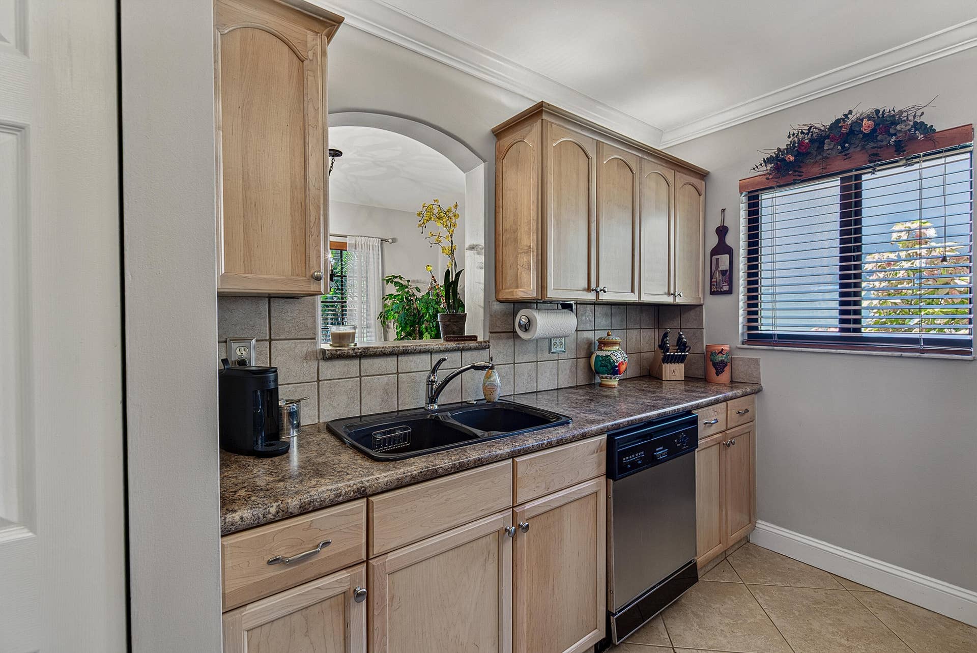 2130 NE 9th Avenue, Wilton Manors, FL 33305 Kitchen opening into Dining Room