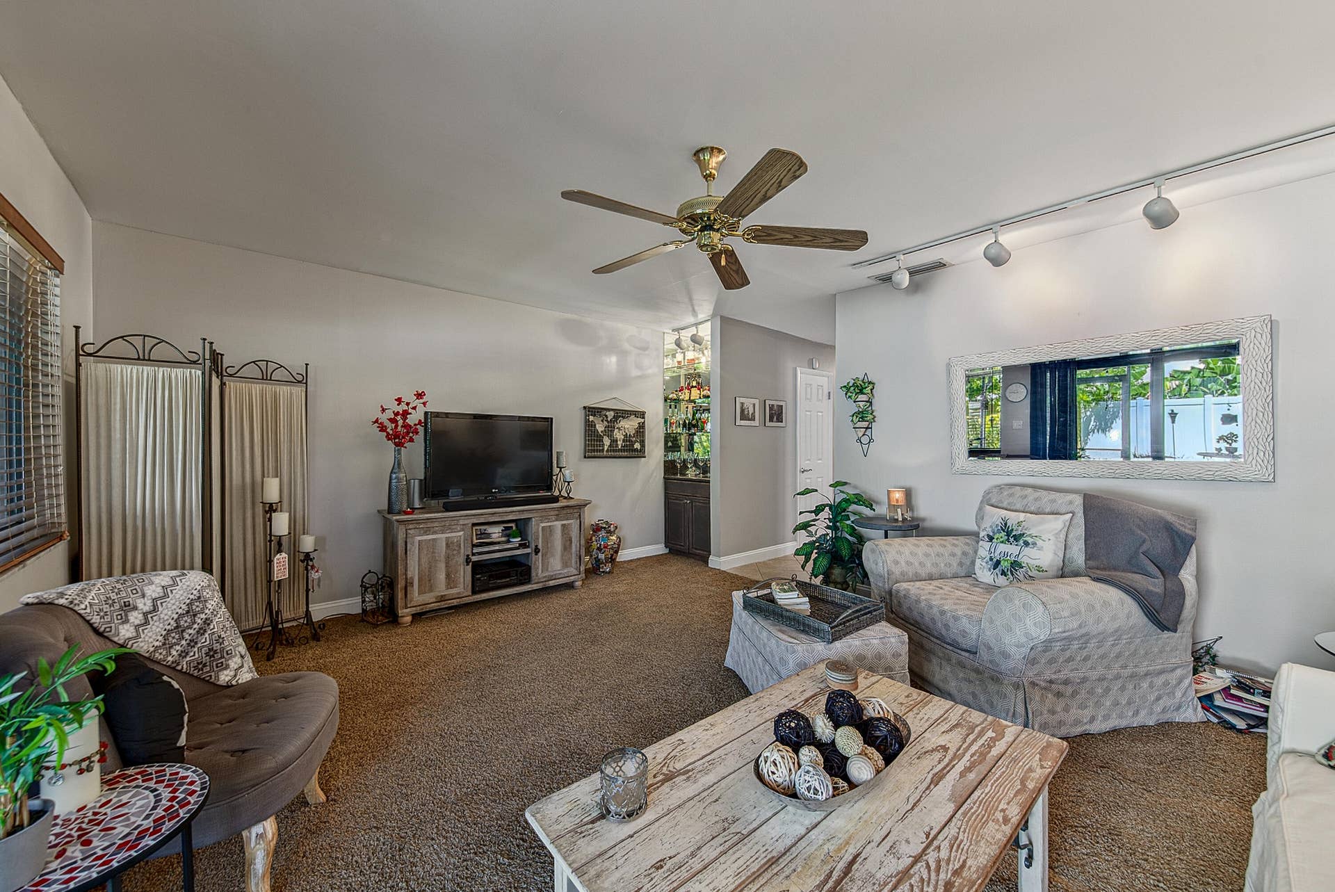 2130 NE 9th Avenue, Wilton Manors, FL 33305 Living room from patio