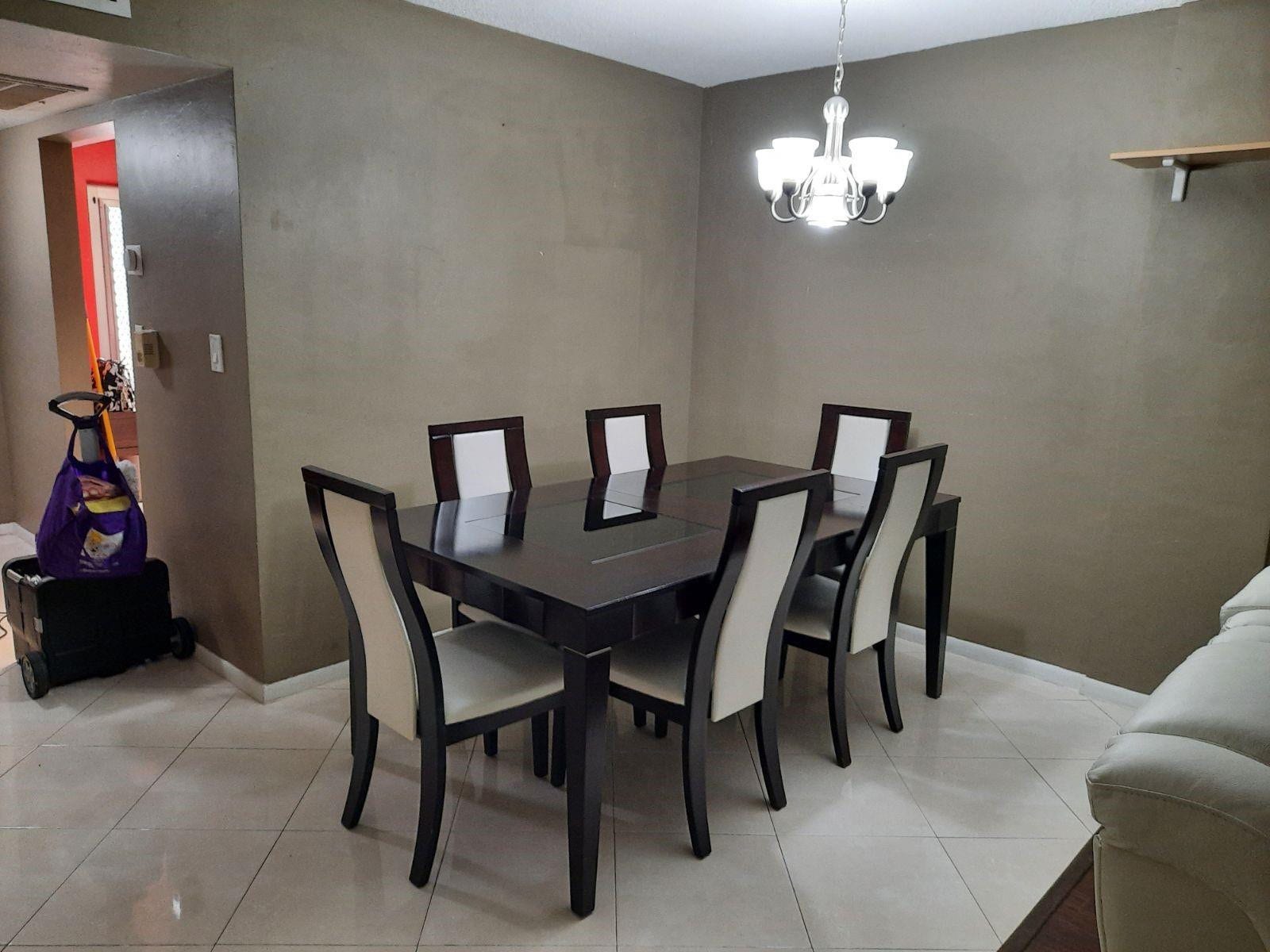 4500 N Federal Highway, #253F, Lighthouse Point, Lighthouse Point, FL 33064 Dining area featuring neutral wall tones and a contemporary chandelier