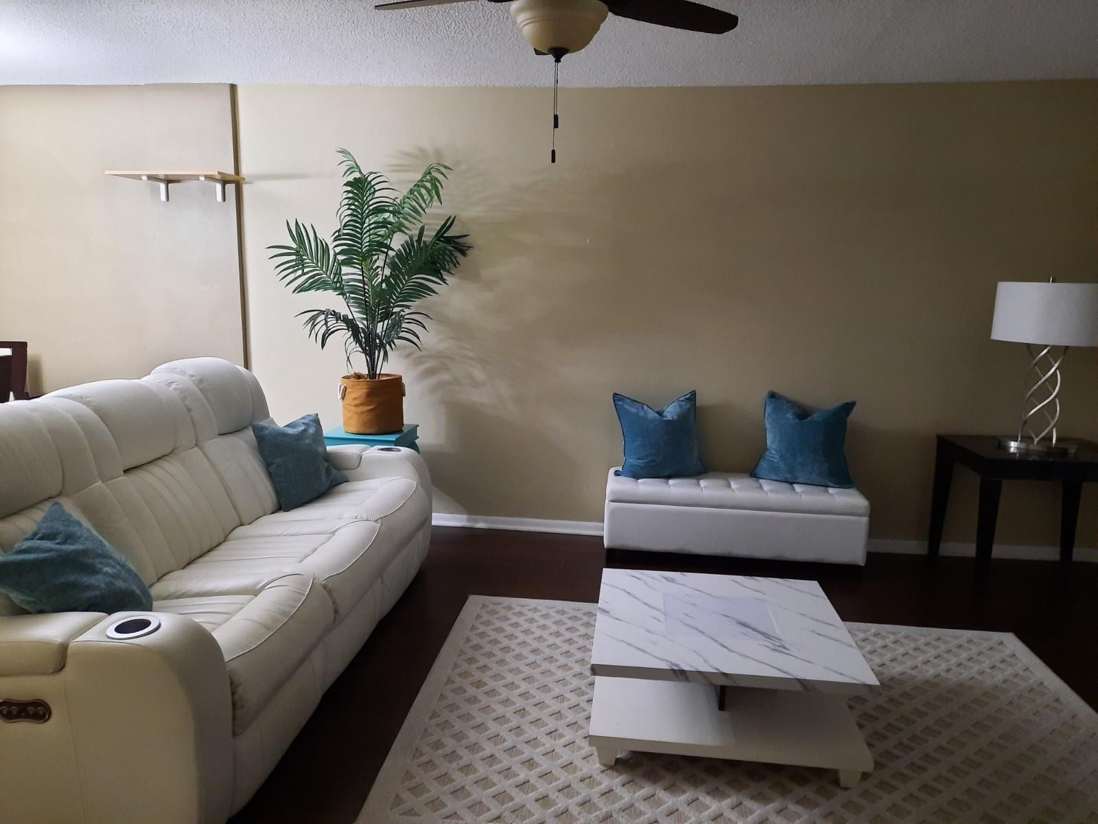 4500 N Federal Highway, #253F, Lighthouse Point, Lighthouse Point, FL 33064 Spacious living area featuring hard-surface flooring, neutral wall tones, and a ceiling fan