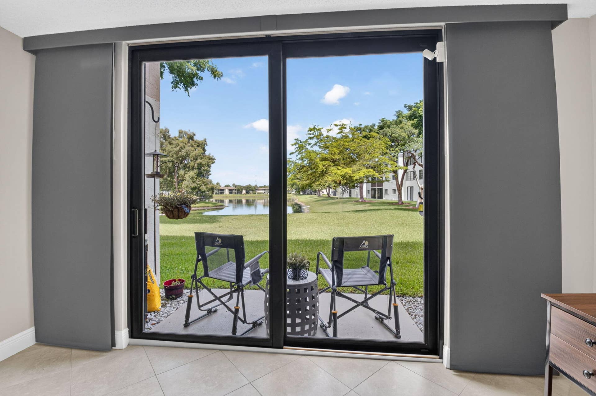 Lake view and outdoor seating from living/dining room