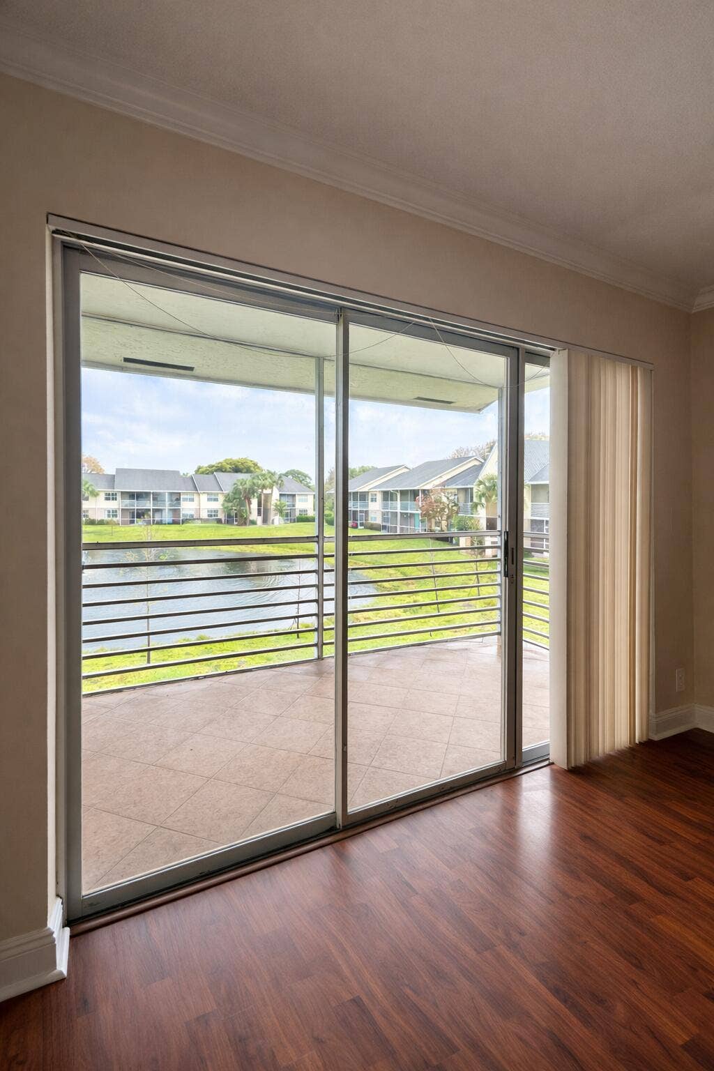 2837 N Course Drive, #202, Pompano Beach, FL 33069 Balcony view over calm pond (1)