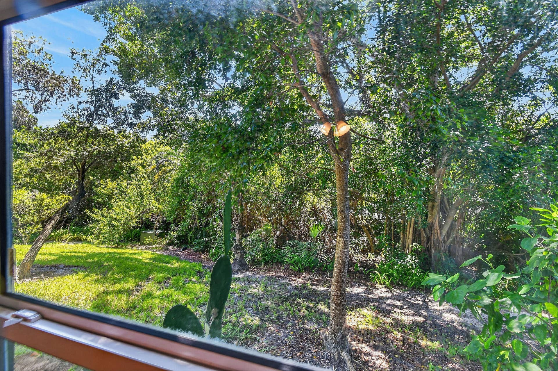 8387 SE Croft Circle, #Q3, Hobe Sound, FL 33455 Tropical landscaped views
