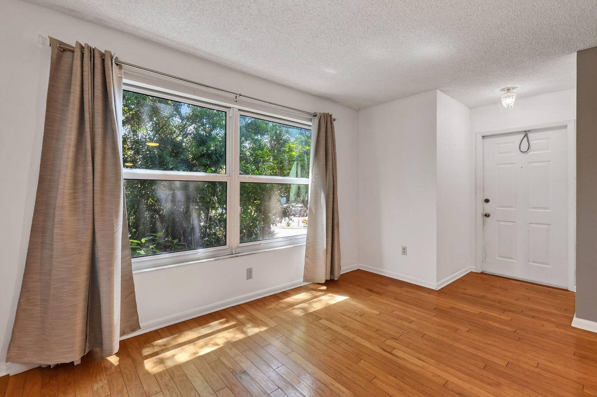 8387 SE Croft Circle, #Q3, Hobe Sound, FL 33455 Private view from the impact windows
