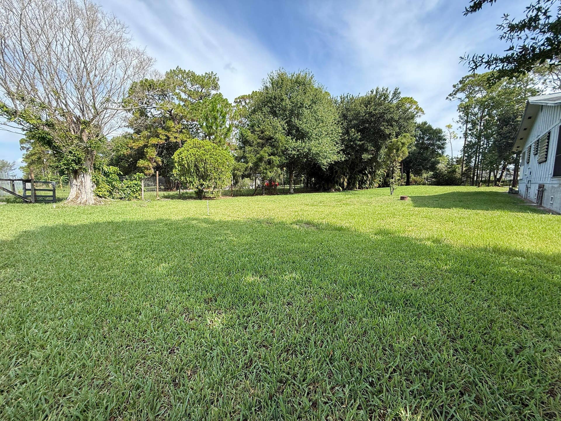 Large green space - you could add a guest house, more storage or child play area!