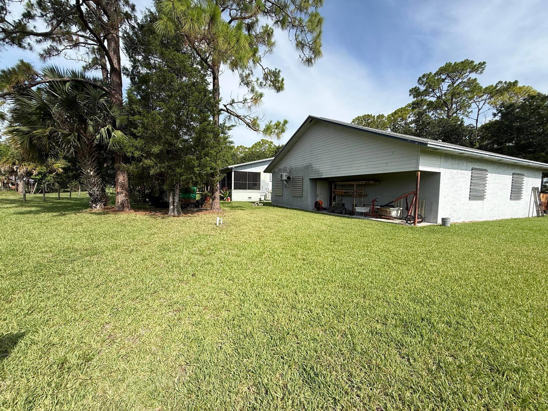 West , back side of property. Showing behind Workshop