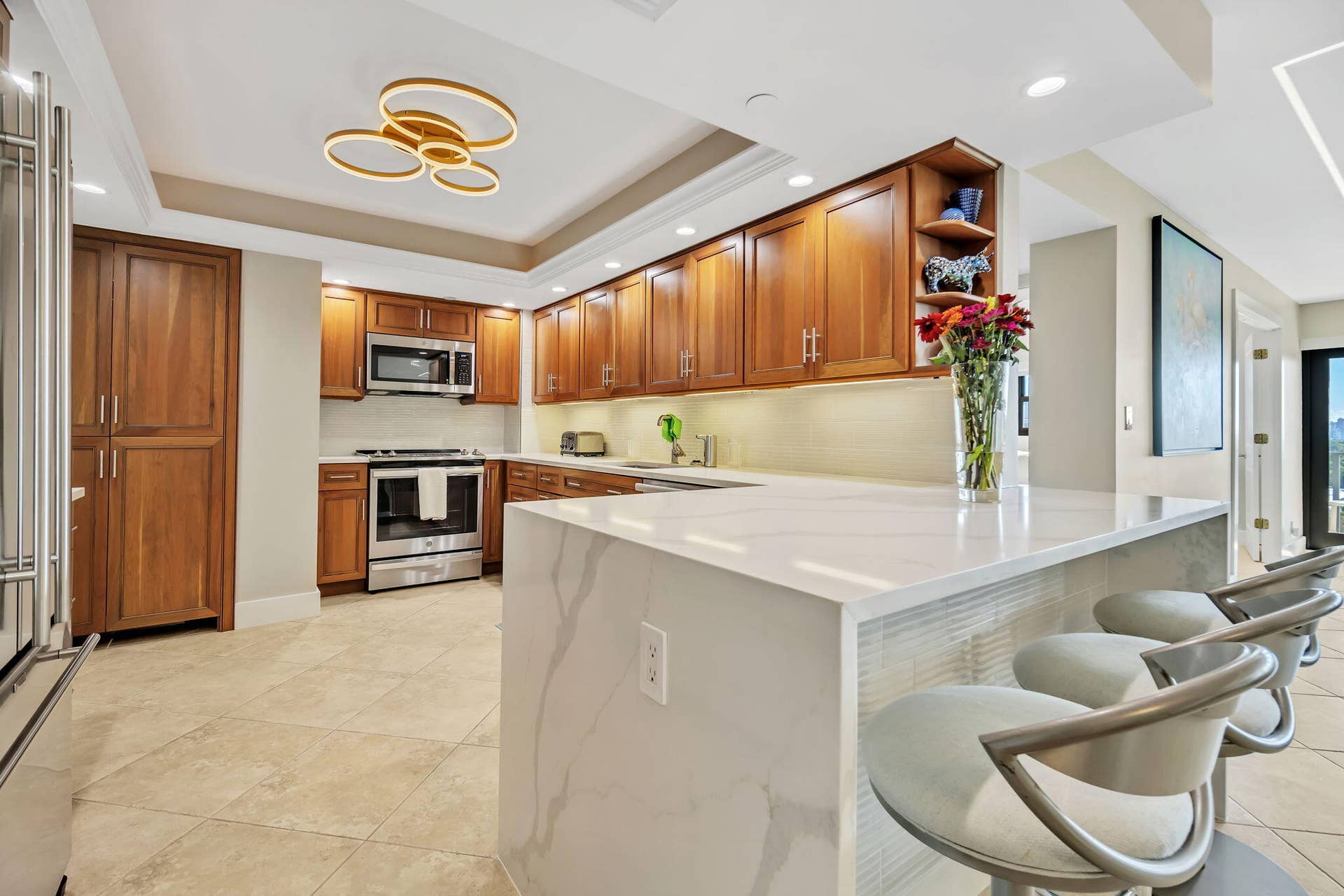 3200 Port Royale Drive N, #902, Fort Lauderdale, FL 33308 upgraded kitchen featuring quartz counter top with waterfall