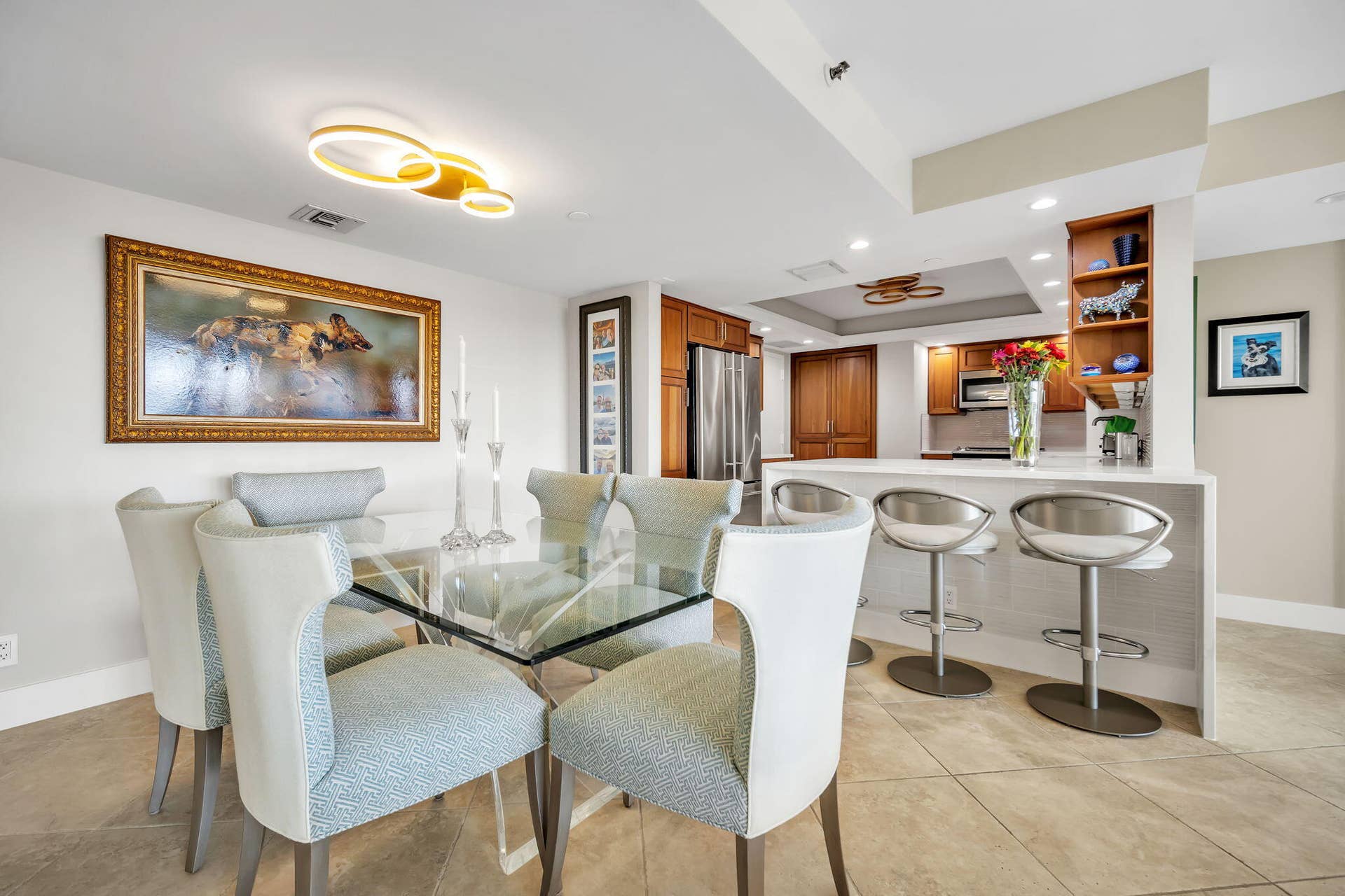 3200 Port Royale Drive N, #902, Fort Lauderdale, FL 33308 Semi-open kitchen concept with adjacent dining room and counter barstools
