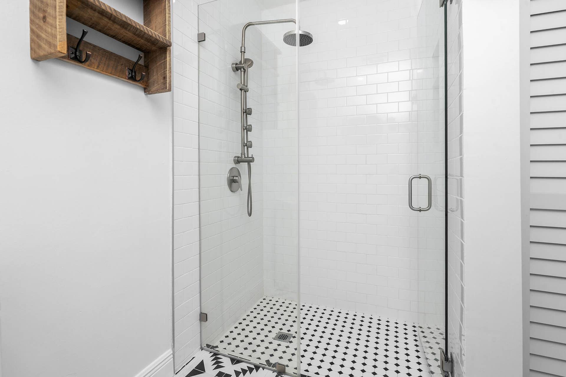 4950 Thoroughbred Lane, Southwest Ranches, FL 33330 Walk-in shower with clear glass enclosure and subway tile surround