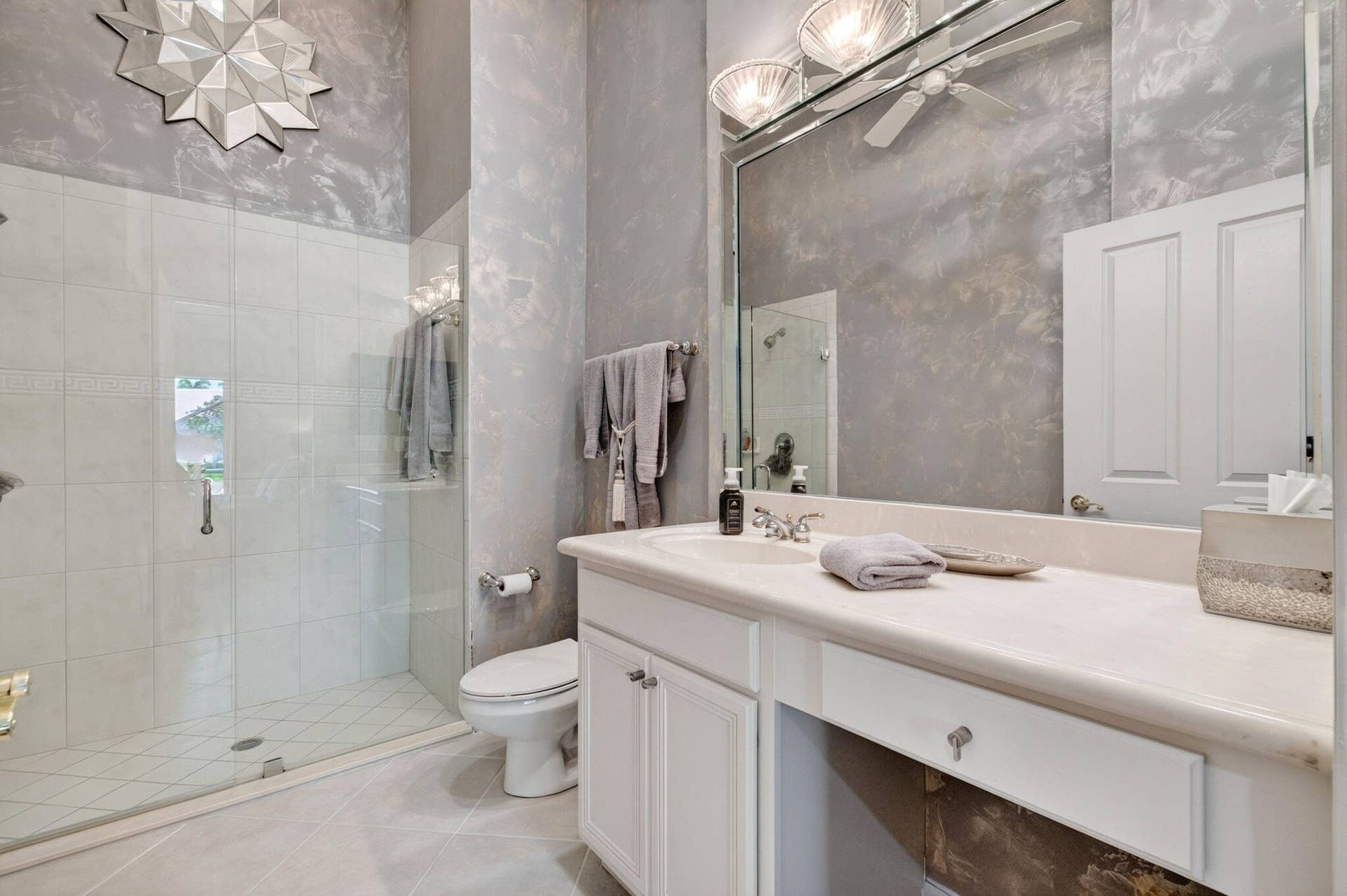 2096 STONINGTON Terrace, West Palm Beach, FL 33411 Custom Decorated Primary Bathroom