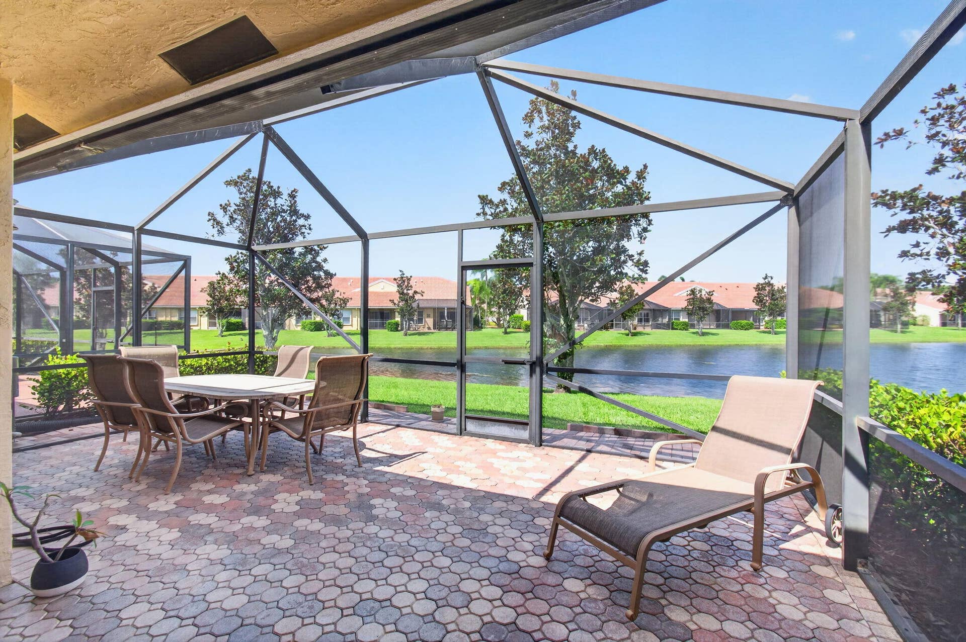 2096 STONINGTON Terrace, West Palm Beach, FL 33411 L-Shaped Patio