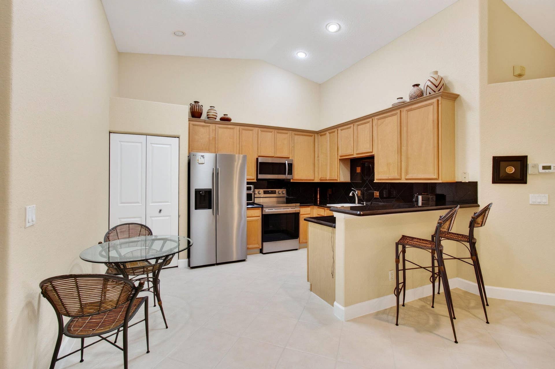 2096 STONINGTON Terrace, West Palm Beach, FL 33411 Dual Level Breakfast Bar