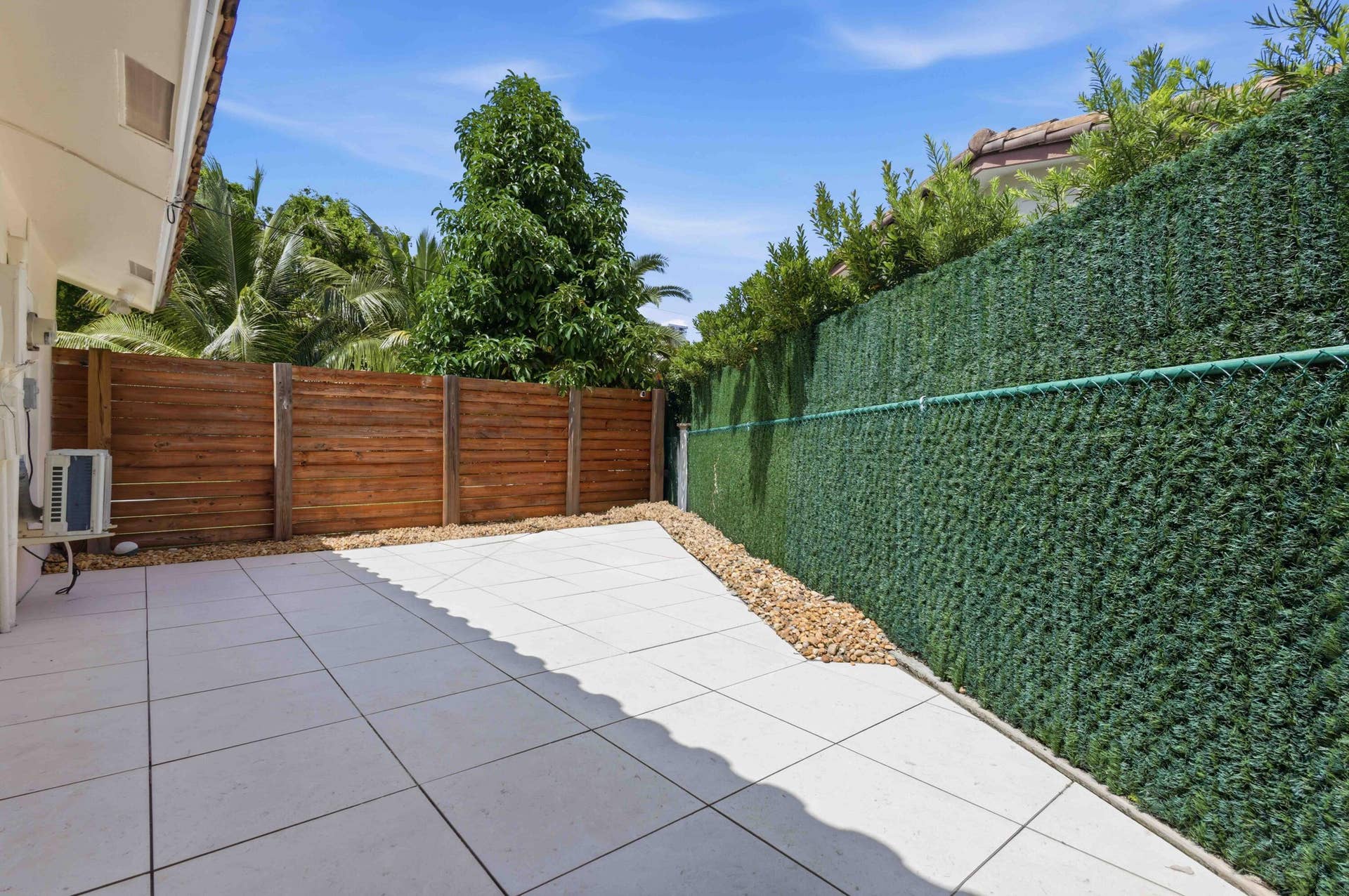 3316 NE 40TH Court, Fort Lauderdale, FL 33308 Spacious outdoor patio featuring large square pavers