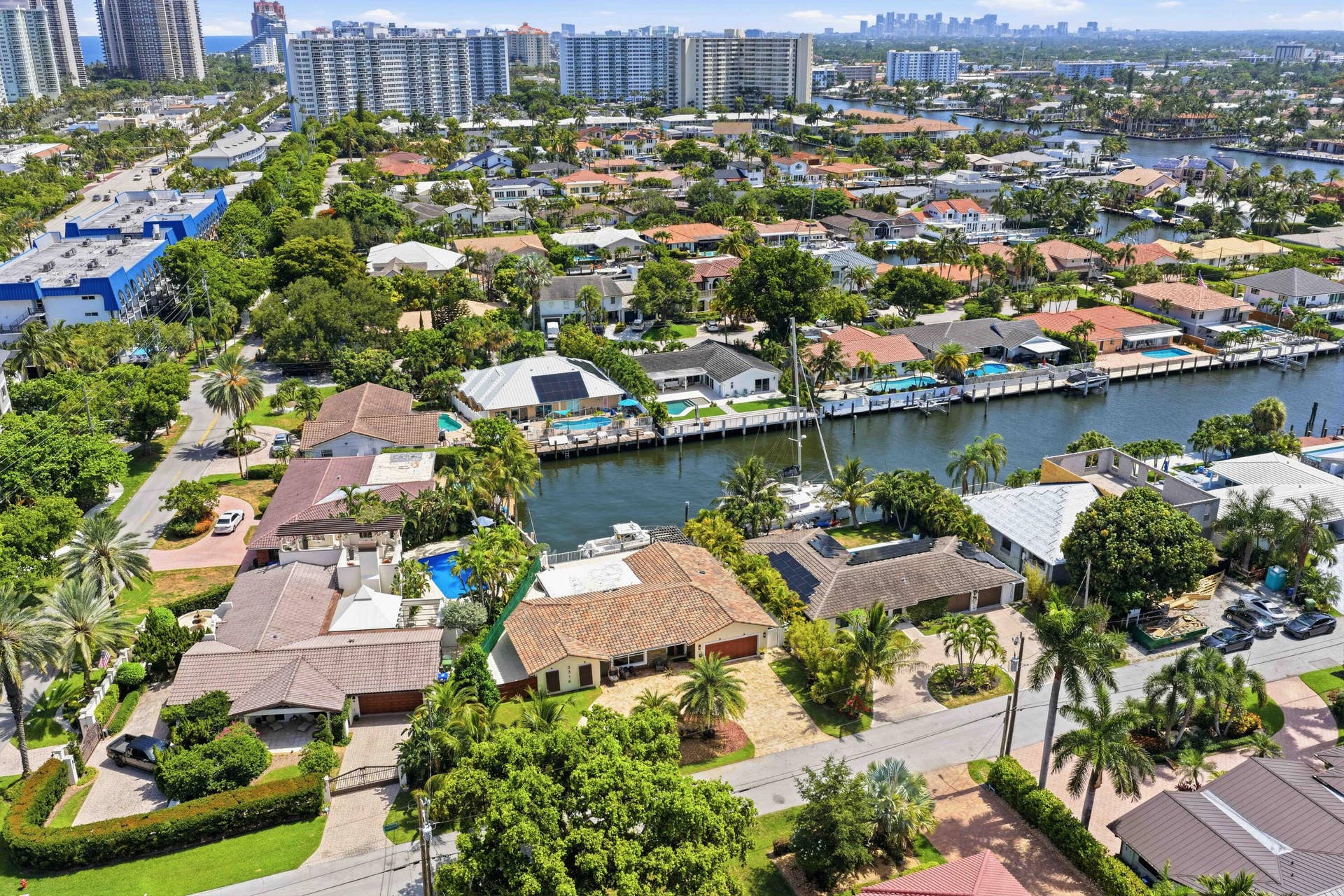 3316 NE 40TH Court, Fort Lauderdale, FL 33308 Waterfront community featuring canal access, private docks, mature landscaping, and residential architecture